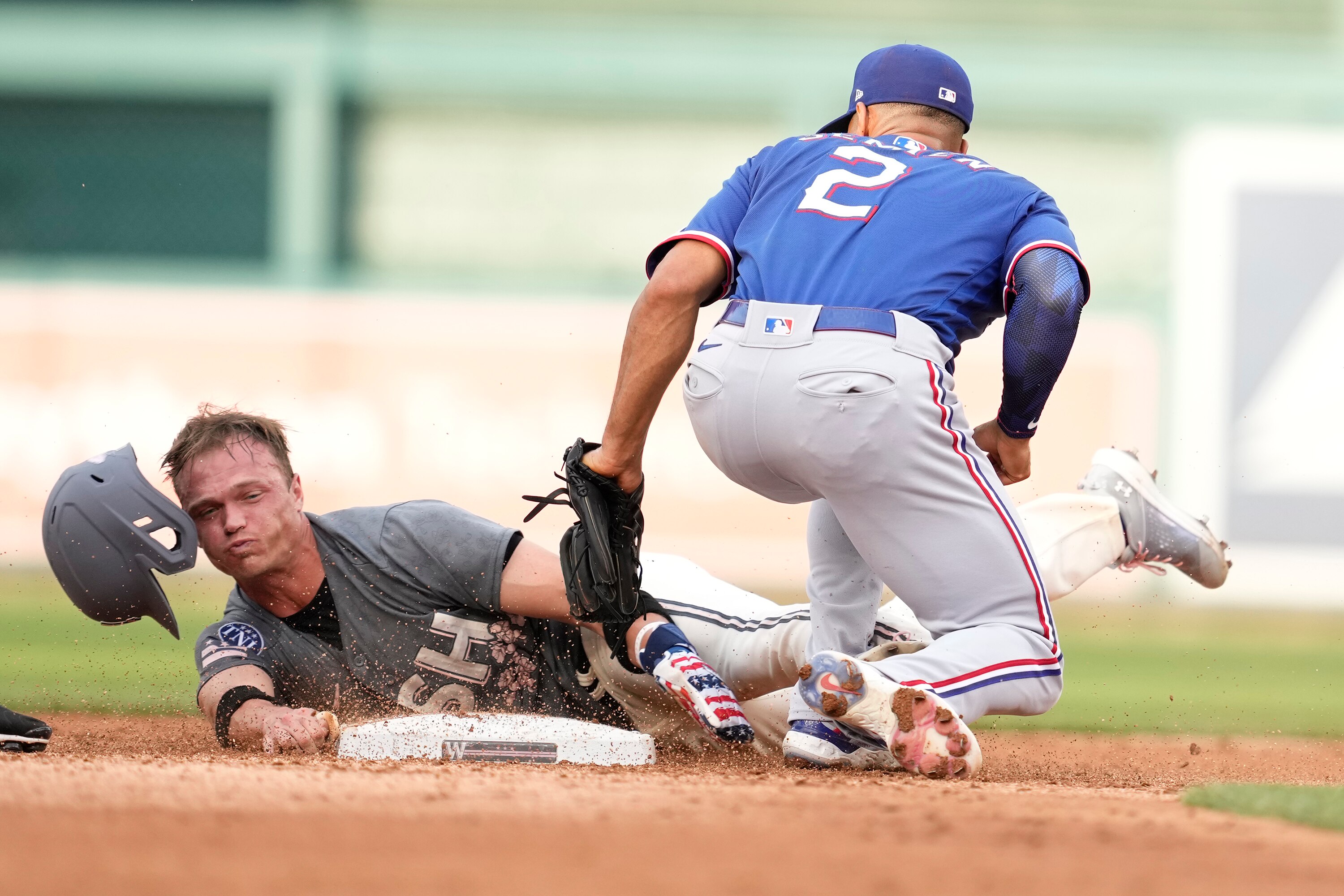 Marcus Semien of the Rangers tags out Alex Call of the Nationals on an attempted steal in the sixth inning.