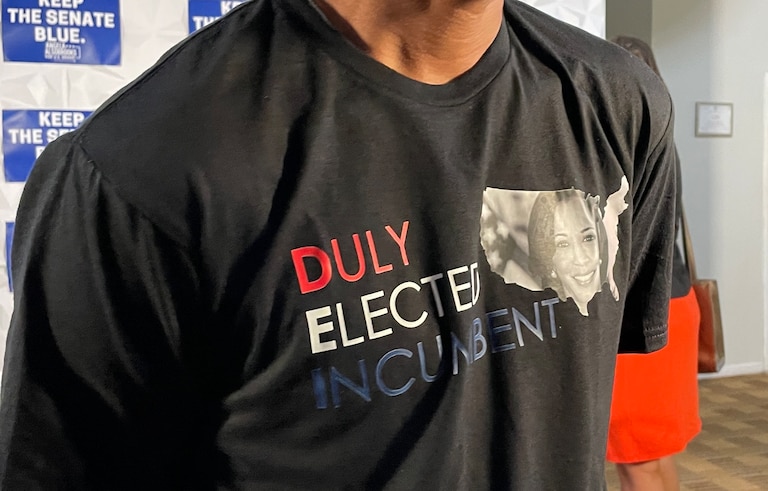 Detail of a "Duly Elected Incumbent" T-shirt featuring a photo of Vice President Kamala Harris, as worn by Baltimore Mayor Brandon M. Scott at the Maryland Democratic Party's Baltimore office on Aug. 13, 2024.
