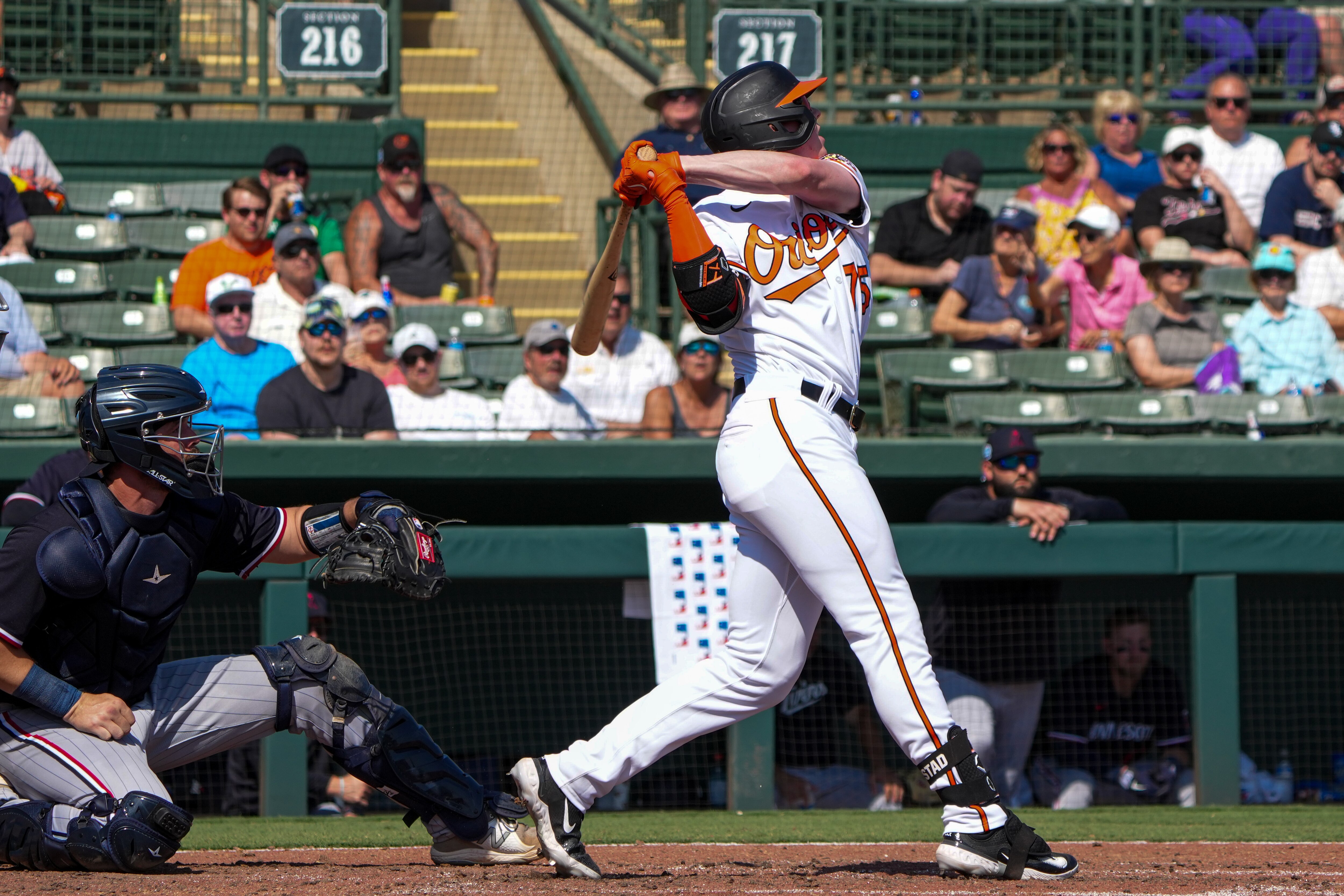 Heston Kjerstad (75) homers at Ed Smith Stadium during the 5th inning of a game against the Minnesota Twins on 2/25/23. The Baltimore Orioles hosted the Twins for their home opener as the Florida Grapefruit League started on Saturday.