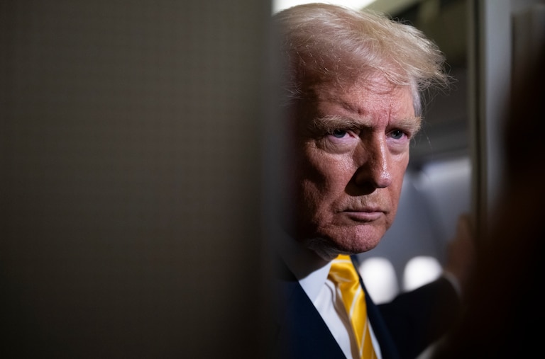 IN FLIGHT - NOVEMBER 14: U.S. President Donald Trump speaks to members of press aboard Air Force One on November 14, 2025 while in flight from Washington, DC to West Palm Beach International Airport. Trump is scheduled to spend the weekend at his Mar-A-Lago estate in Palm Beach, Florida. (Photo by Roberto Schmidt/Getty Images)