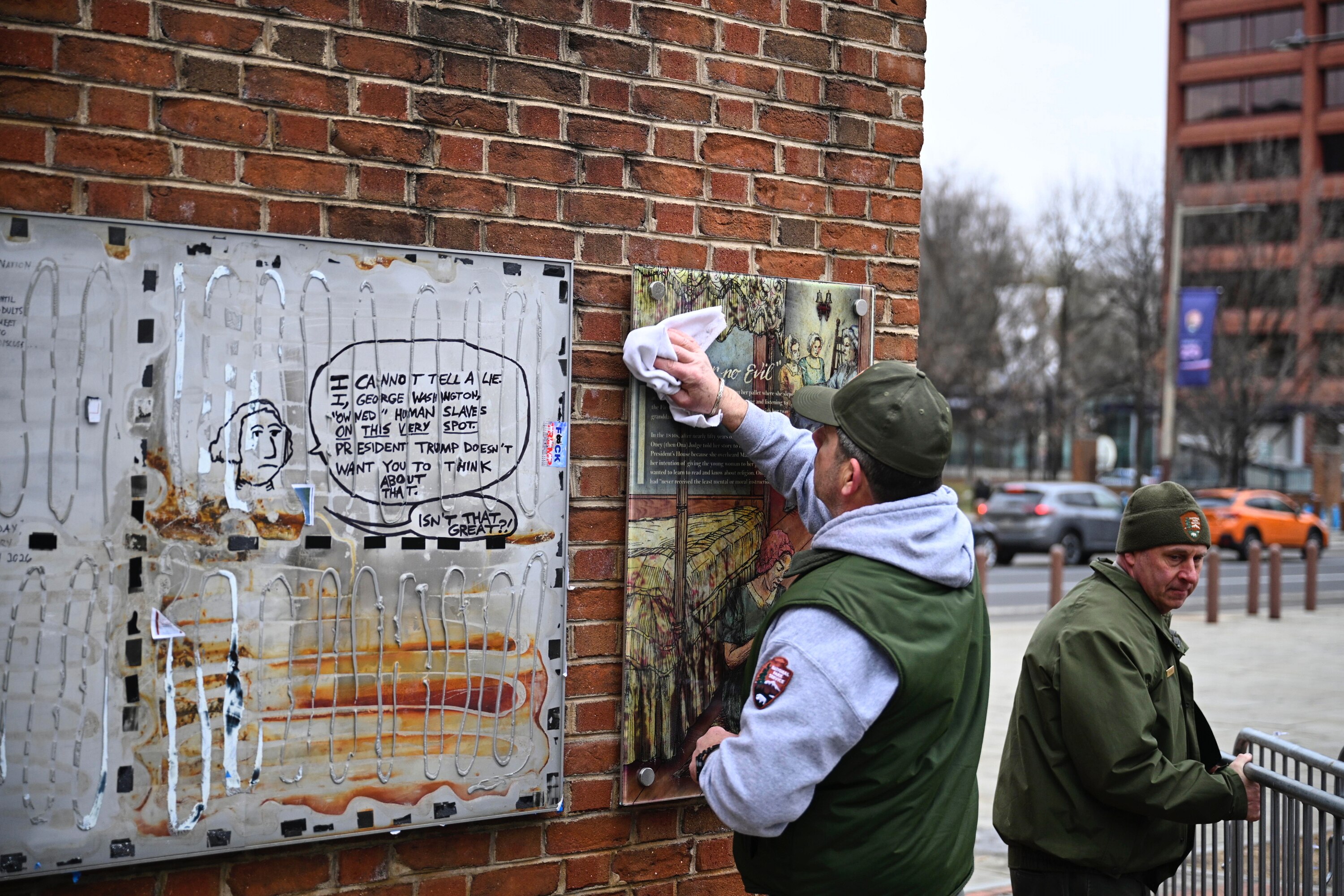 Panels that were part of an exhibit on slavery at the President's House Site in Philadelphia are put back Thursday, Feb. 19, 2026.
