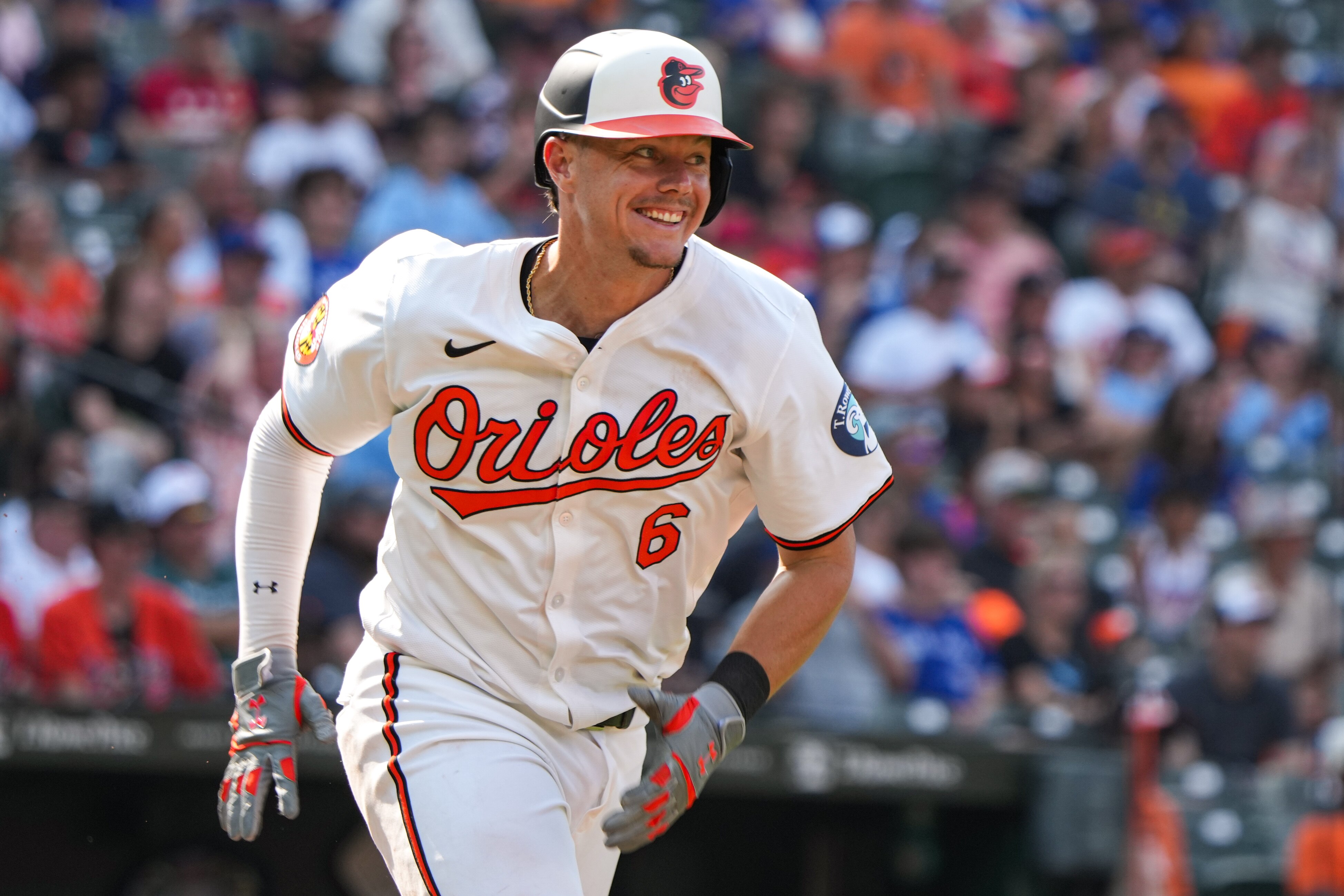Baltimore Orioles first baseman Ryan Mountcastle (6) smiles after singling and scoring a teammate during a game against the Toronto Blue Jays at Camden Yards on July 29, 2024.