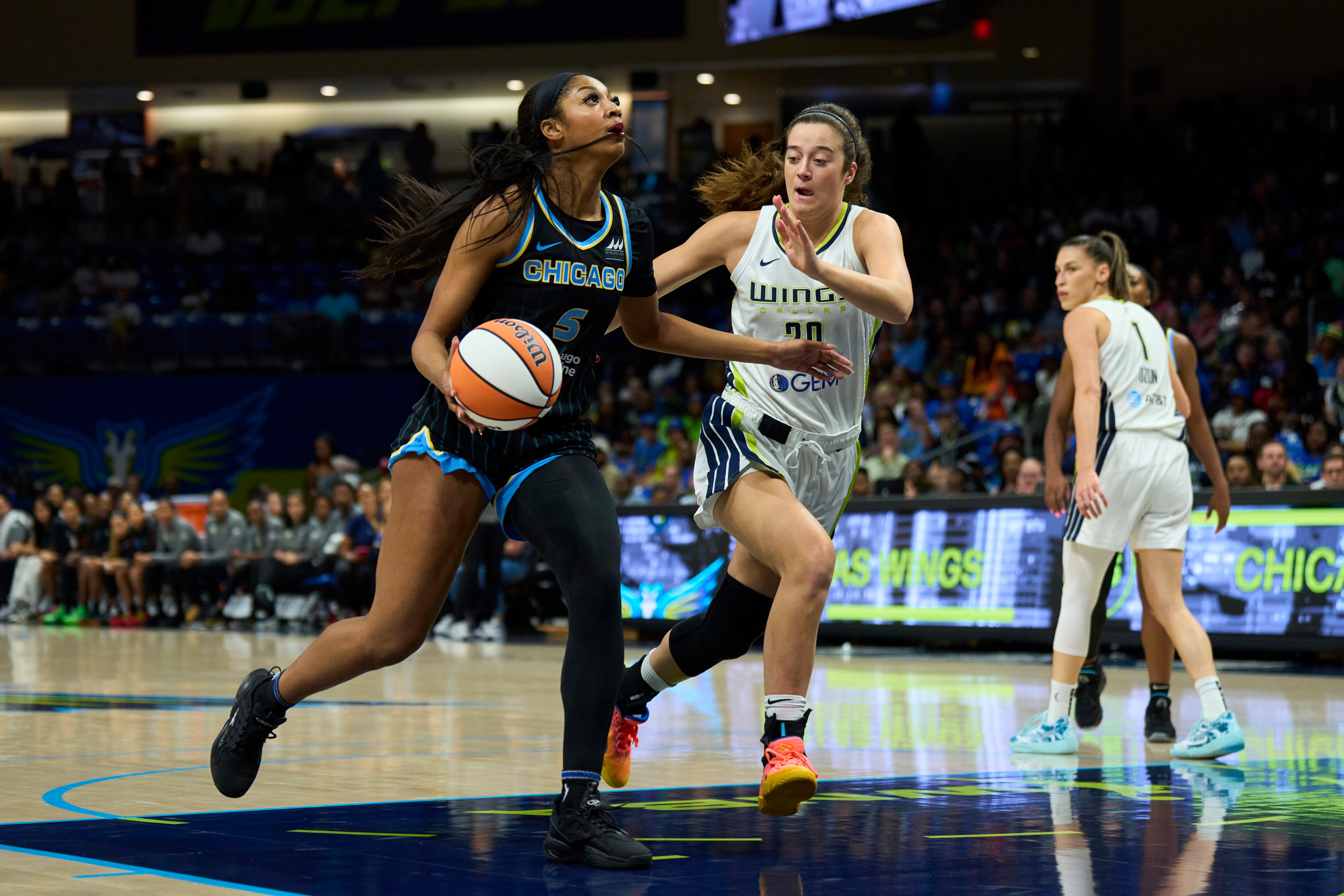 Angel Reese of the Chicago Sky drives to the basket during the first half Wednesday night against the Dallas Wings.