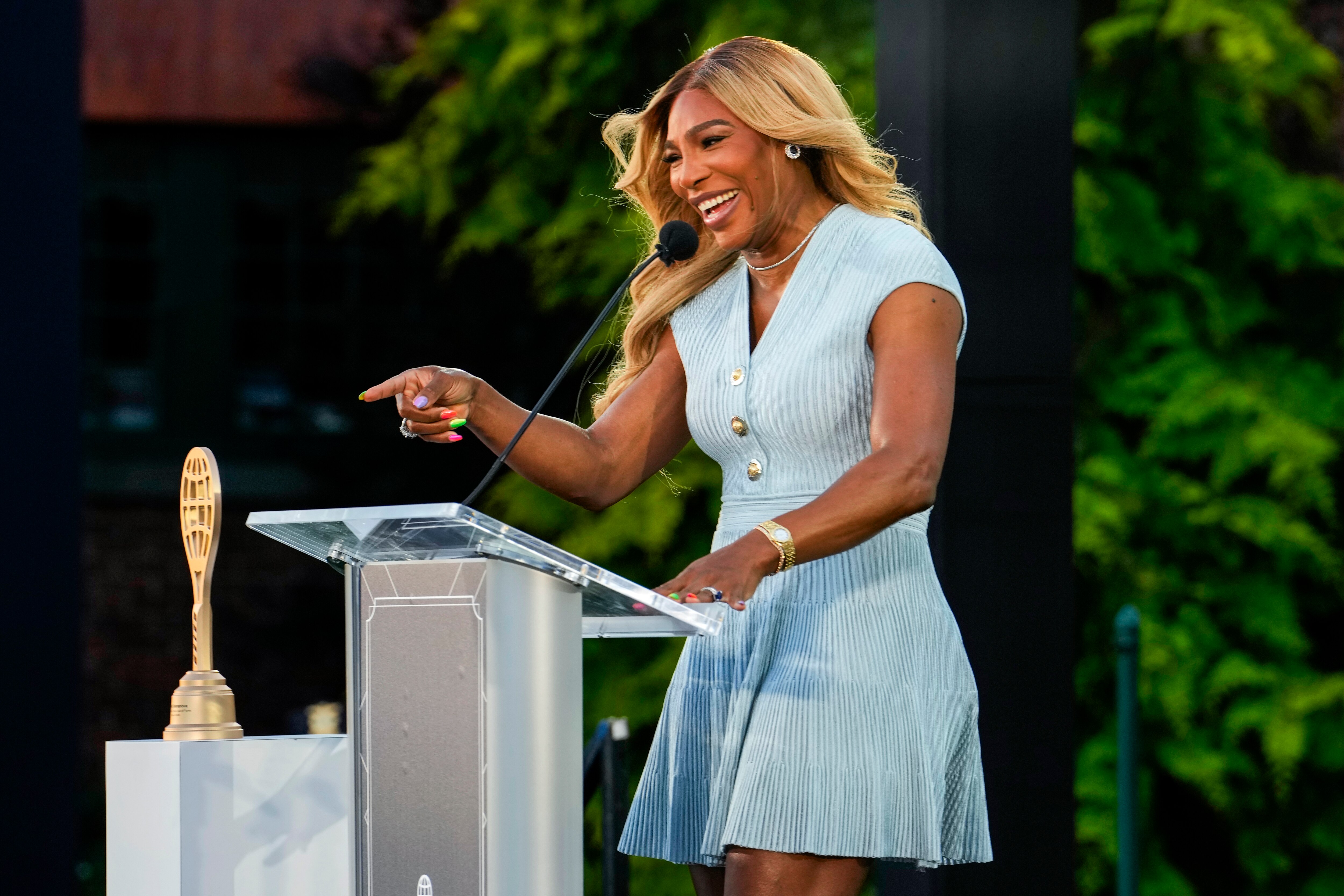 NEWPORT, RHODE ISLAND - AUGUST 23: Serena Williams introduces Maria Sharapova during the 2025 Induction Celebration weekend at the International Tennis Hall of Fame in Newport, R.I. on Saturday, August 23, 2025.