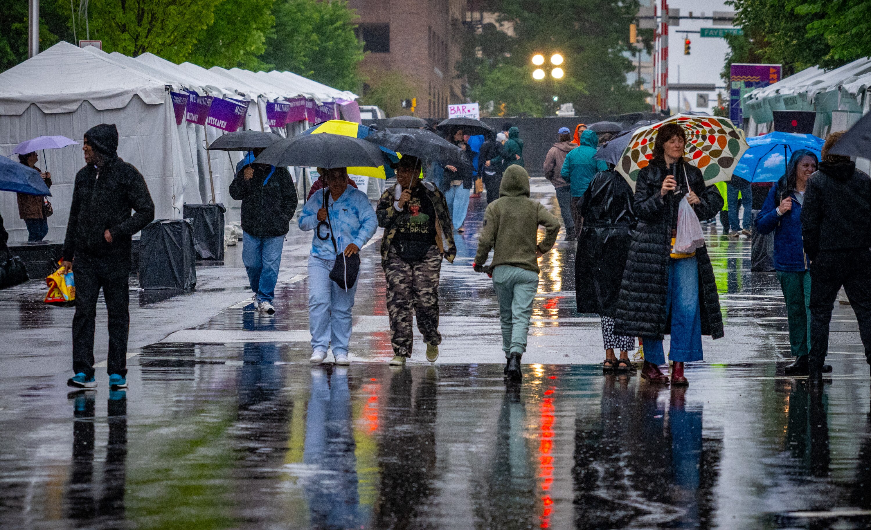 Umbrellas were a necessary accessory for the outdoor venues at a rainy Artscape last month.