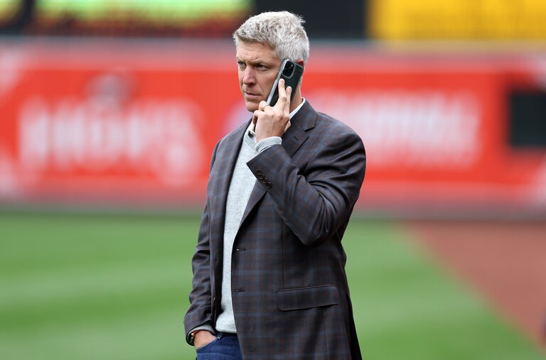 Baltimore Orioles general manager Mike Elias talks on the phone before the start of the Orioles and New York Yankees game at Oriole Park at Camden Yards on April 08, 2023 in Baltimore, Maryland.