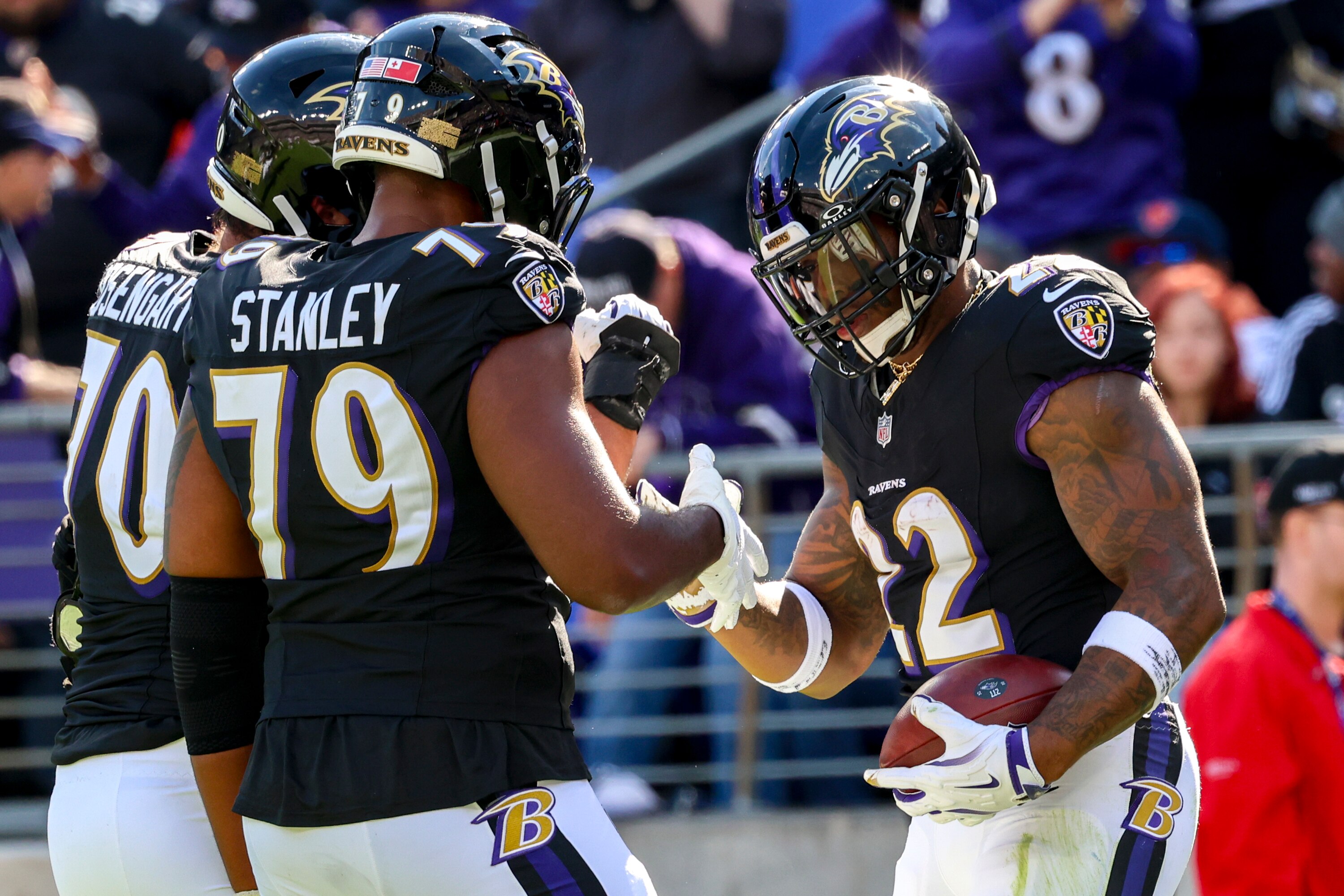 Baltimore Ravens running back Derrick Henry celebrates a touchdown against the Chicago Bears in the first half of Sunday's game.