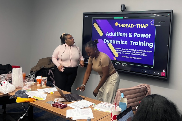 Point Source Youth consultants give a presentation during a Targeted Housing Assistance Program certification training in December.