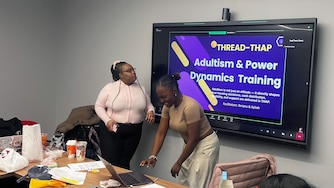 Point Source Youth consultants give a presentation during a Targeted Housing Assistance Program certification training in December.