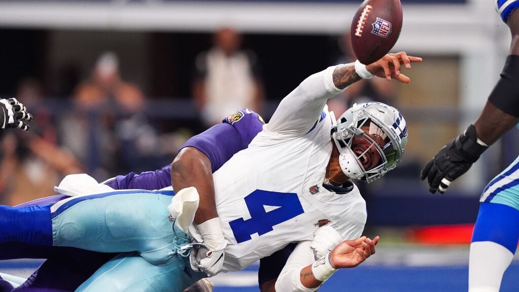 ARLINGTON, TEXAS - SEPTEMBER 22: Quarterback Dak Prescott #4 of the Dallas Cowboys attempts an illegal pass against the Baltimore Ravens during the second quarter at AT&T Stadium on September 22, 2024 in Arlington, Texas. (Photo by Sam Hodde/Getty Images)