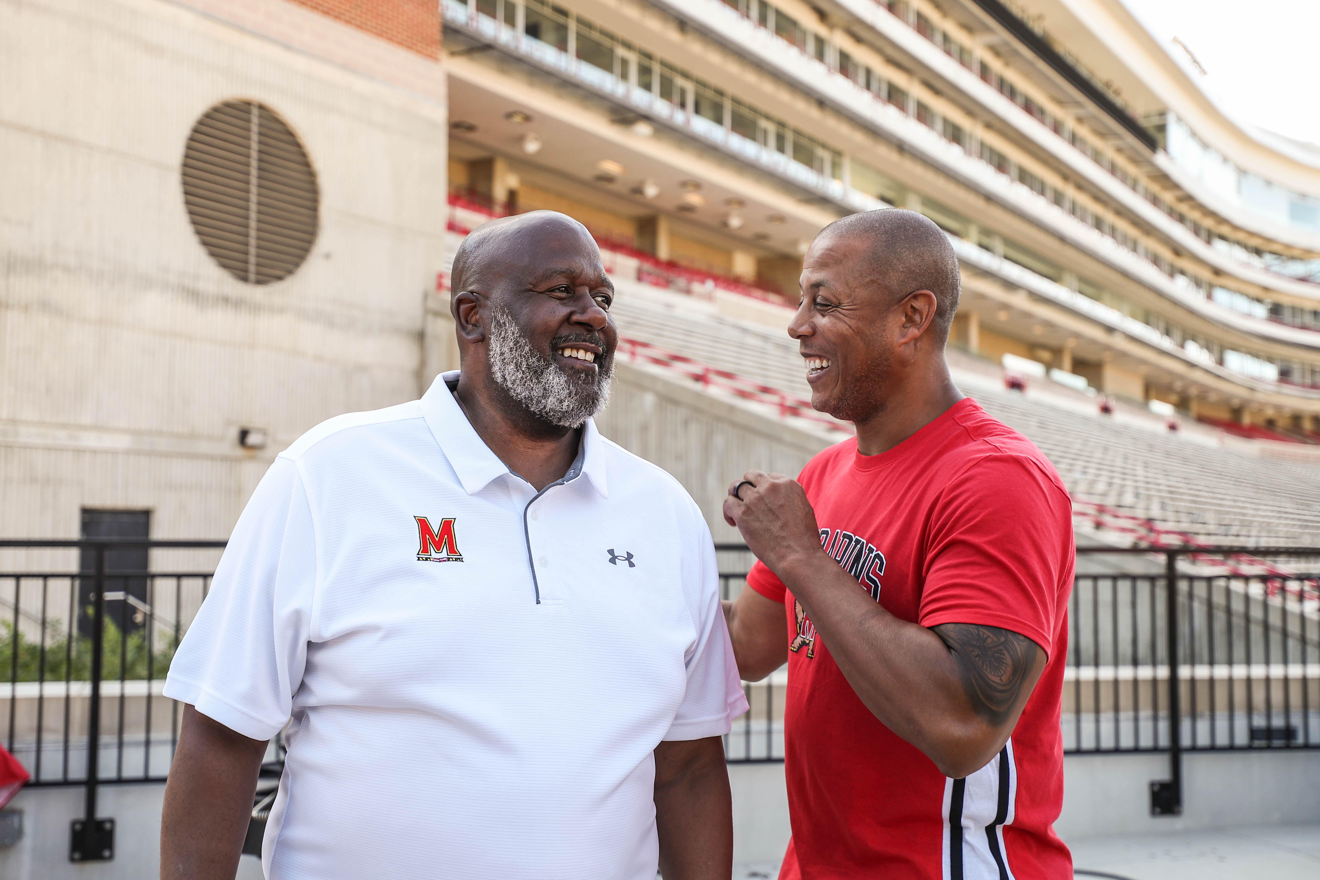 Head Football Coach Michael Locksley and Athletic Director Damon Evans