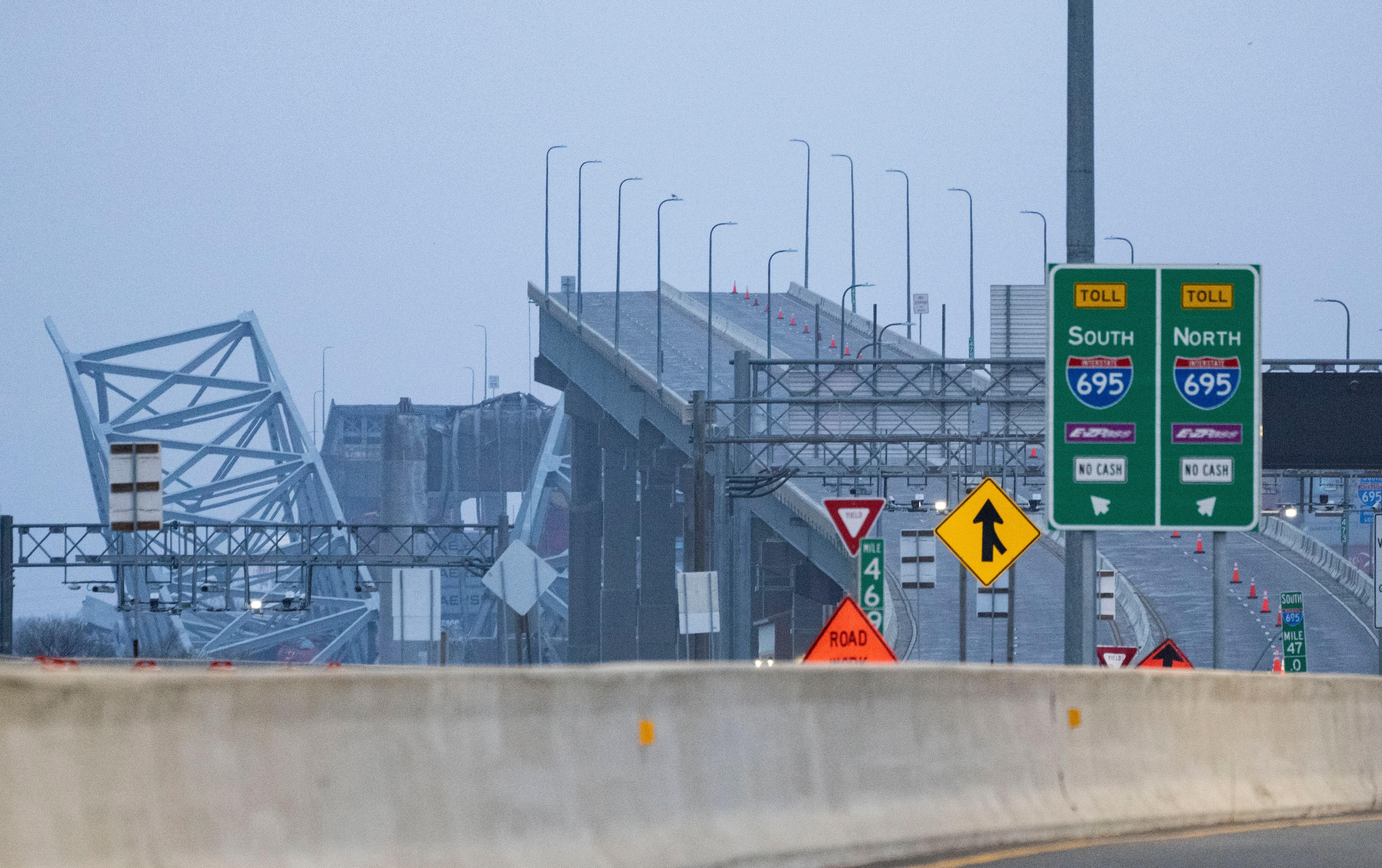 A view of the collapsed Francis Scott Key Bridge wreckage seen from Authority Drive in Dundalk on March 27, 2024. The bridge collapsed when a cargo ship struck it.