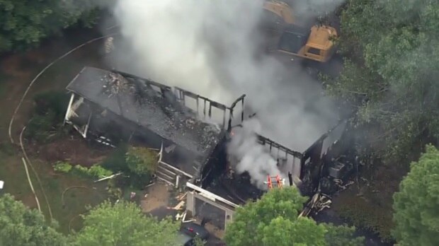 Aerial images of the scene at the 20500 block of Deer Wood Park Drive in St. Mary’s County show a heavily damaged home.