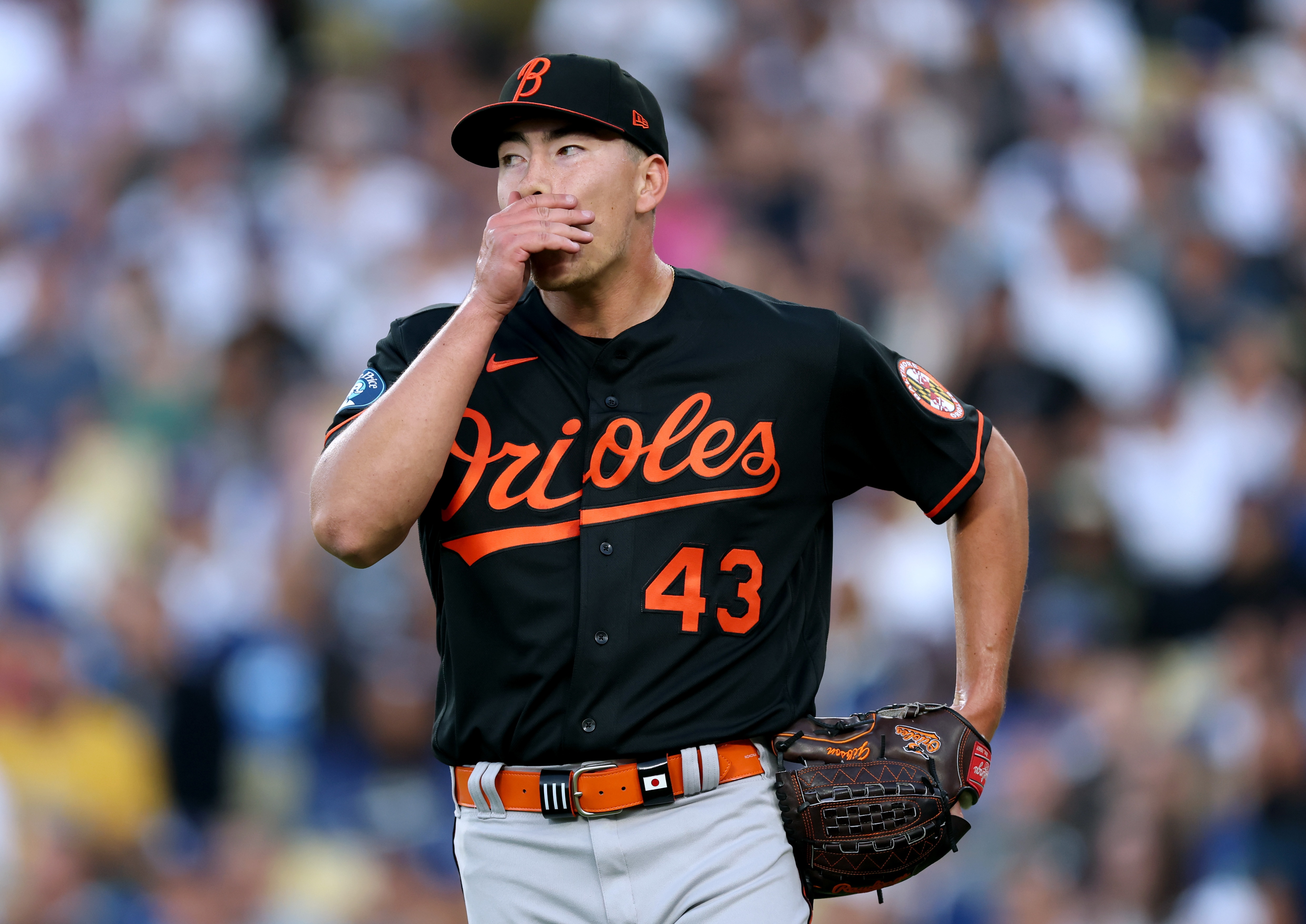 Starter Trey Gibson worked out of trouble and gave the Orioles a chance. (Photo by Harry How/Getty Images)