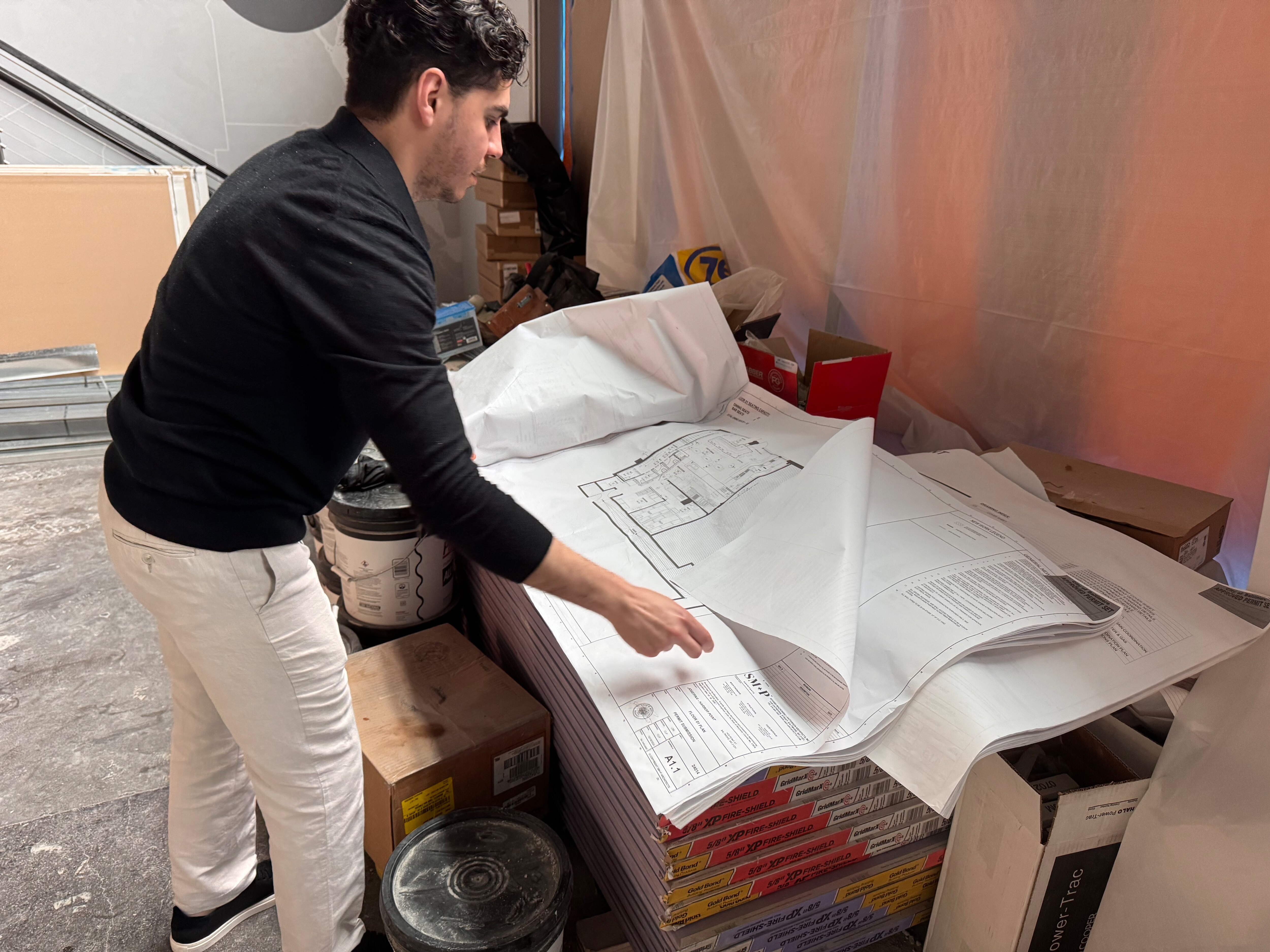 Chef David Zamudio shows off plans for Josefina, his new Spanish fine-dining restaurant in Harbor Point.