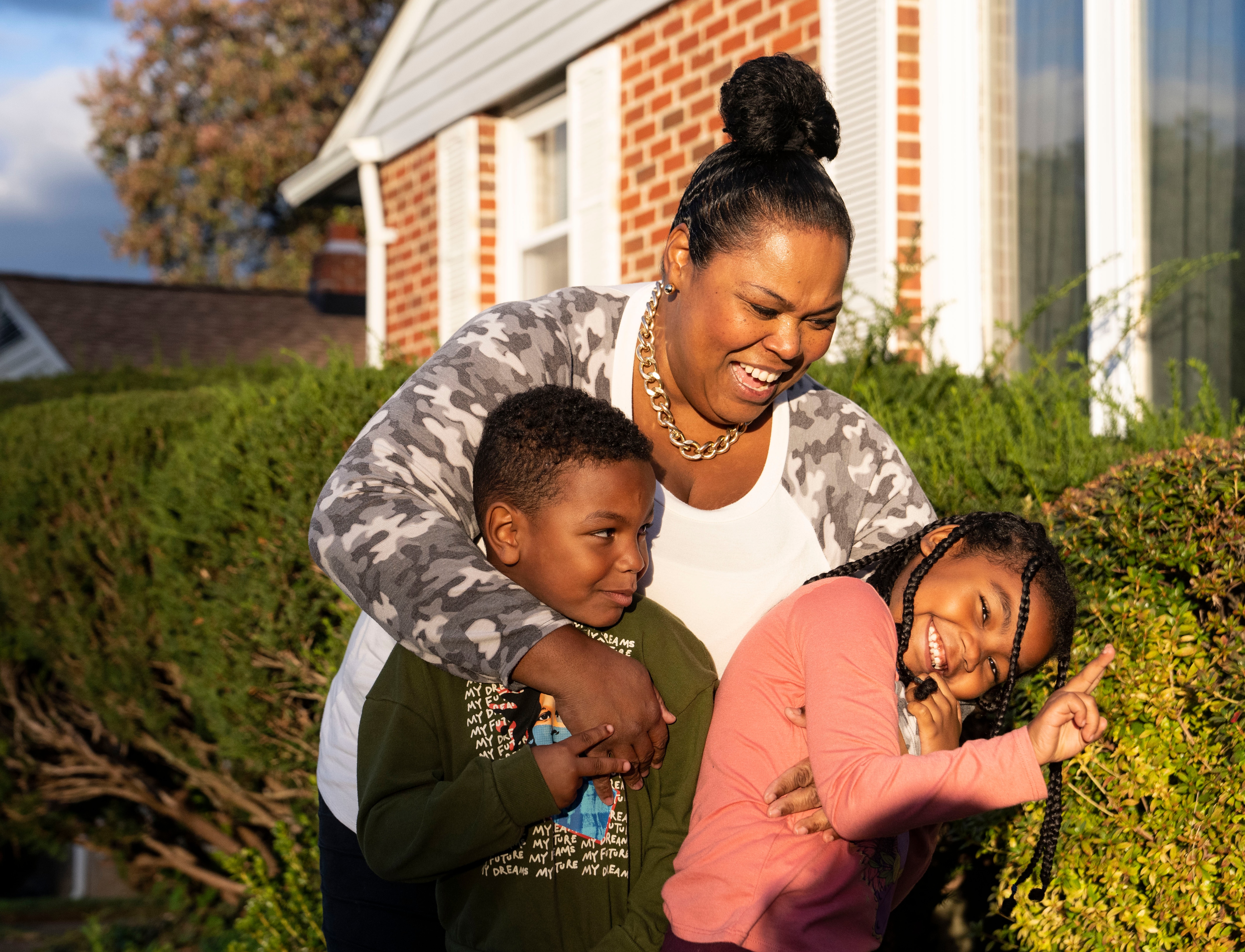 Angie Washington, center, with her 5-year-old son Julian, left, and 6-year-old daughter Faith.