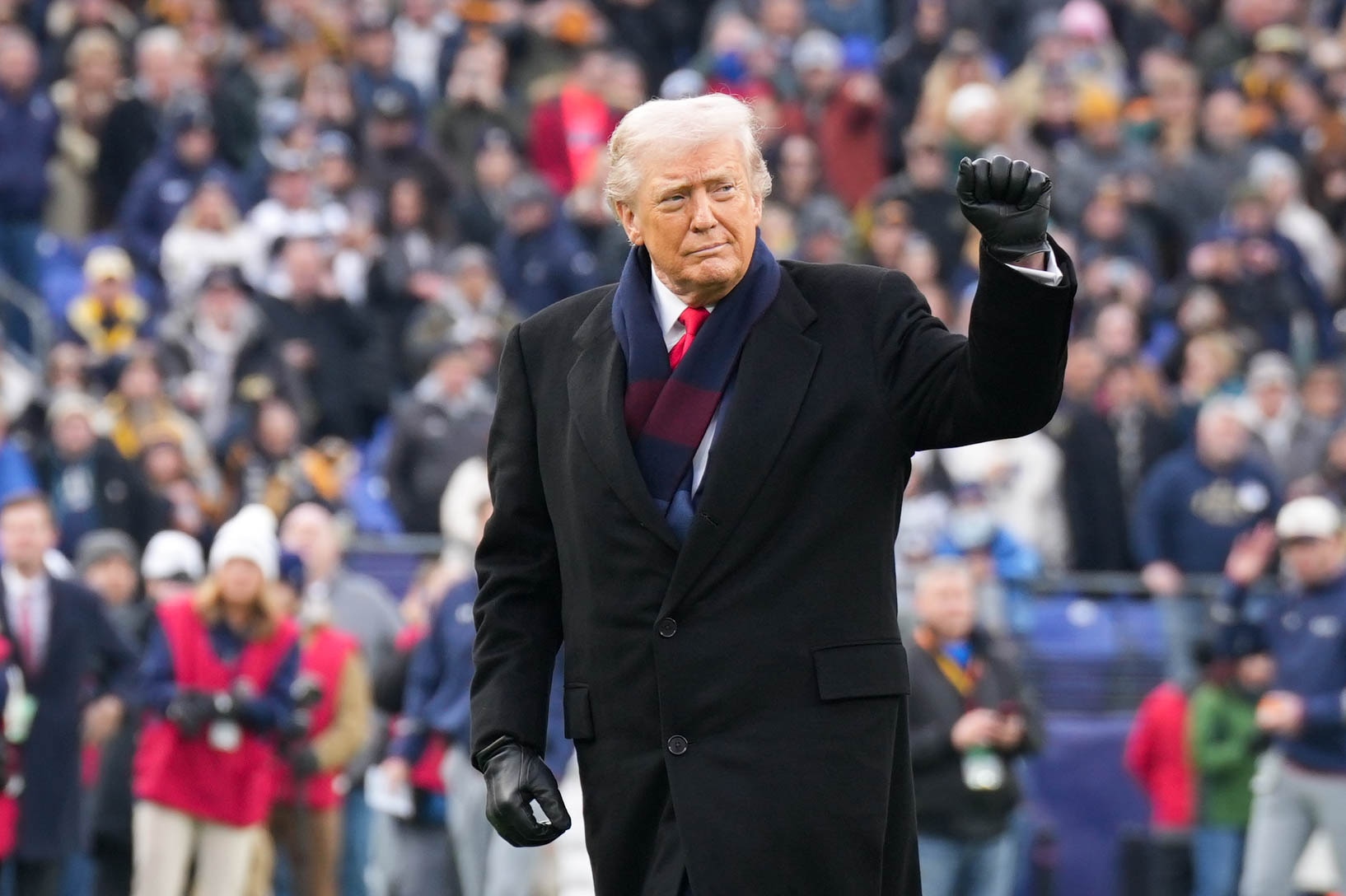 President Donald Trump walks to the field at M&T Bank Stadium ahead of the 2025 Army-Navy football game.