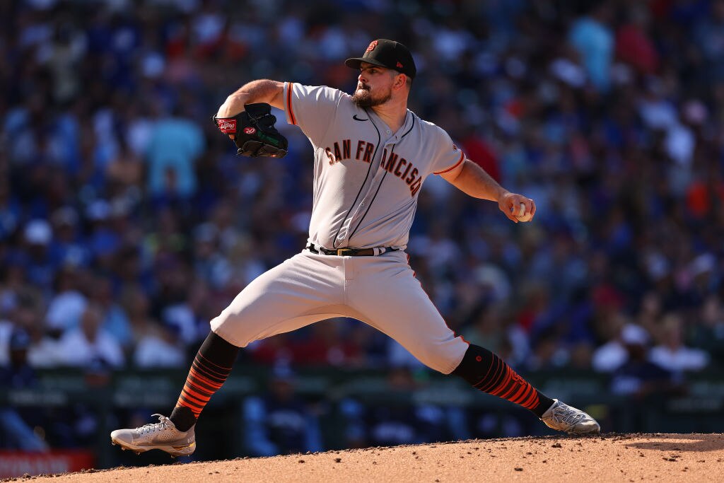CHICAGO, ILLINOIS - SEPTEMBER 09: Carlos Rodon #16 of the San Francisco Giants delivers a pitch against the Chicago Cubs at Wrigley Field on September 09, 2022 in Chicago, Illinois.