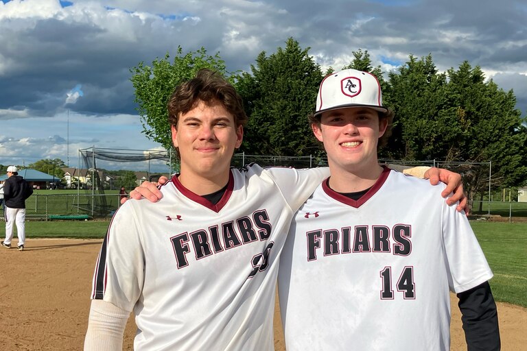 Junior catcher Derek Poole, left, clouted his second homer of the season and sophomore right-hander Nathaniel Welcos retired the first 20 batters he faced in No. 6 Archbishop Curley’s 1-0 victory over top-ranked Archbishop Spalding on Wednesday afternoon.