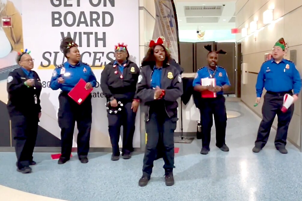 The TSA choir sings a cover of "All I Want For Christmas Is You" at the Baltimore-Washington International Thurgood Marshall Airport.