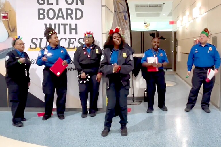 The TSA choir sings a cover of "All I Want For Christmas Is You" at the Baltimore-Washington International Thurgood Marshall Airport.