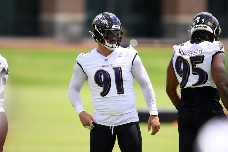 Ravens outside linebacker Trey Hendrickson works out during practice on June 10.