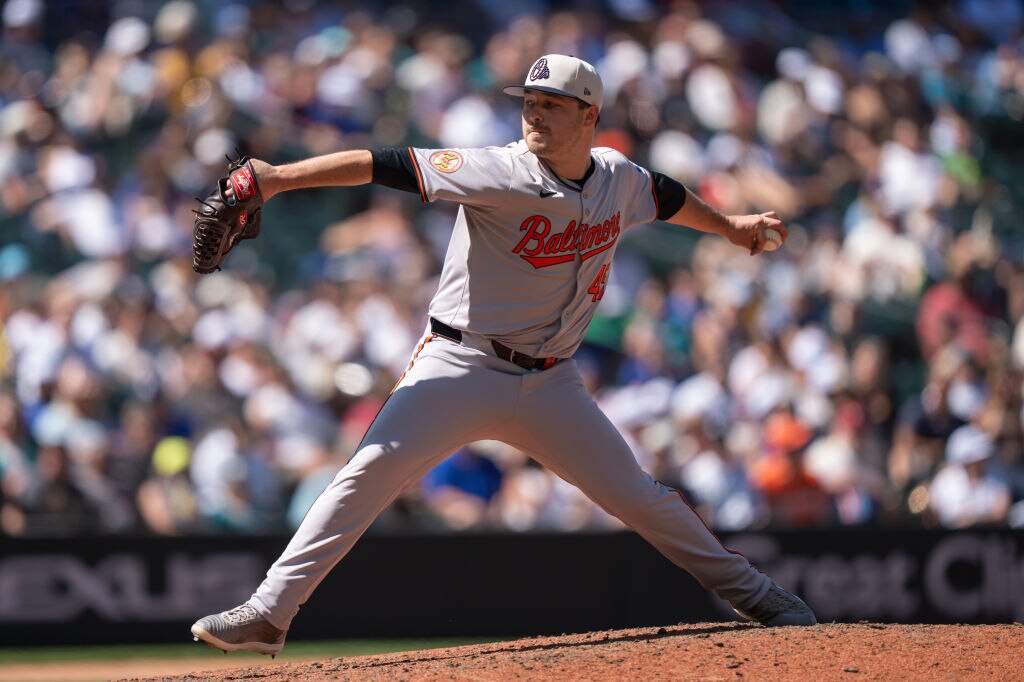 Reliever Keegan Akin, #45 of the Baltimore Orioles, delivers a pitch during the seventh inning of a game against the Seattle Mariners at T-Mobile Park on July 4, 2024 in Seattle, Washington. (Photo by Stephen Brashear/Getty Images)
