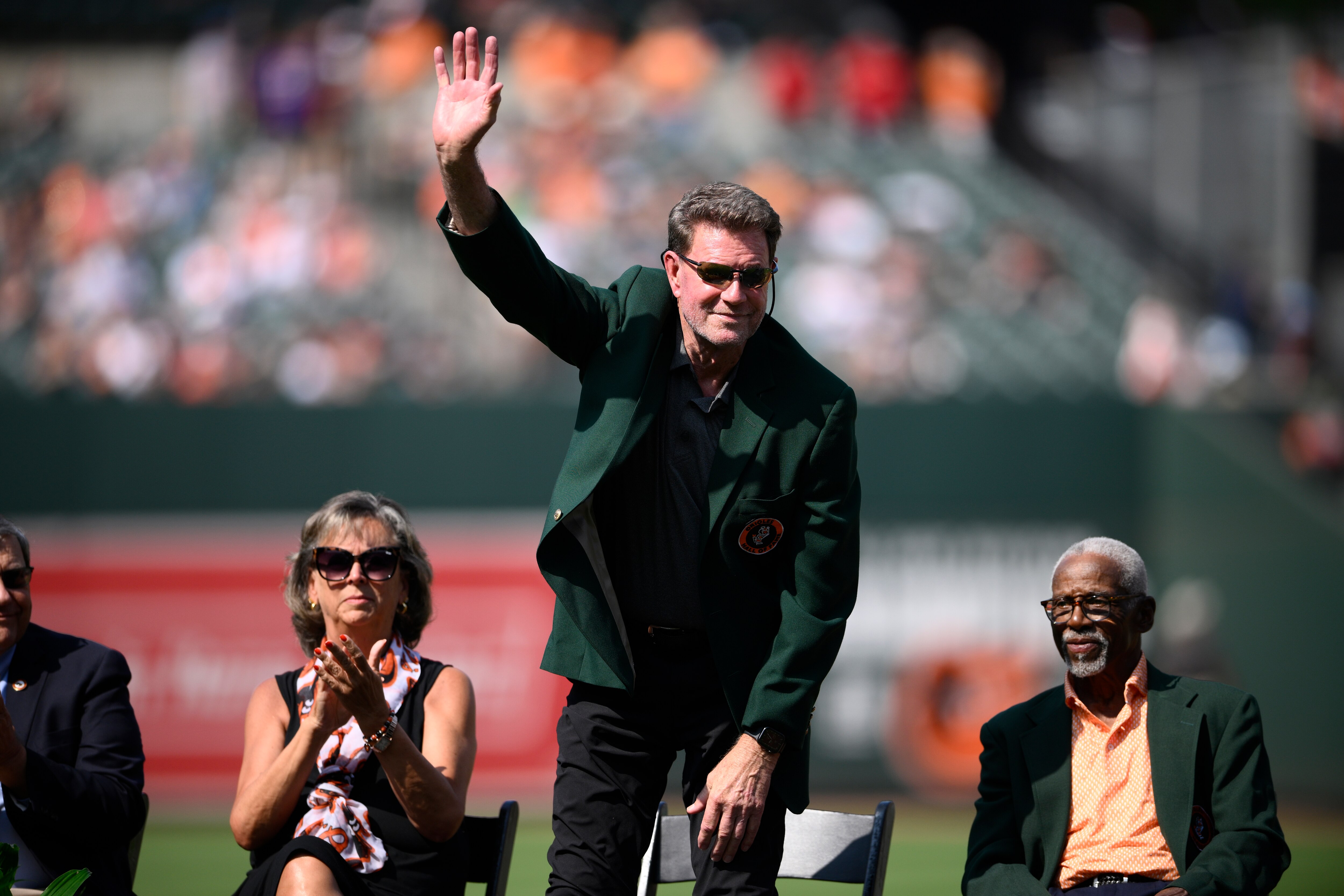 Orioles Hall of Fame pitcher Jim Palmer waves during a team hall of fame pregame ceremony on Aug. 24, 2024.