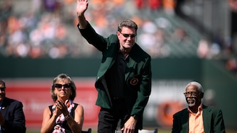 Orioles Hall of Fame pitcher Jim Palmer waves during a team hall of fame pregame ceremony on Aug. 24, 2024.