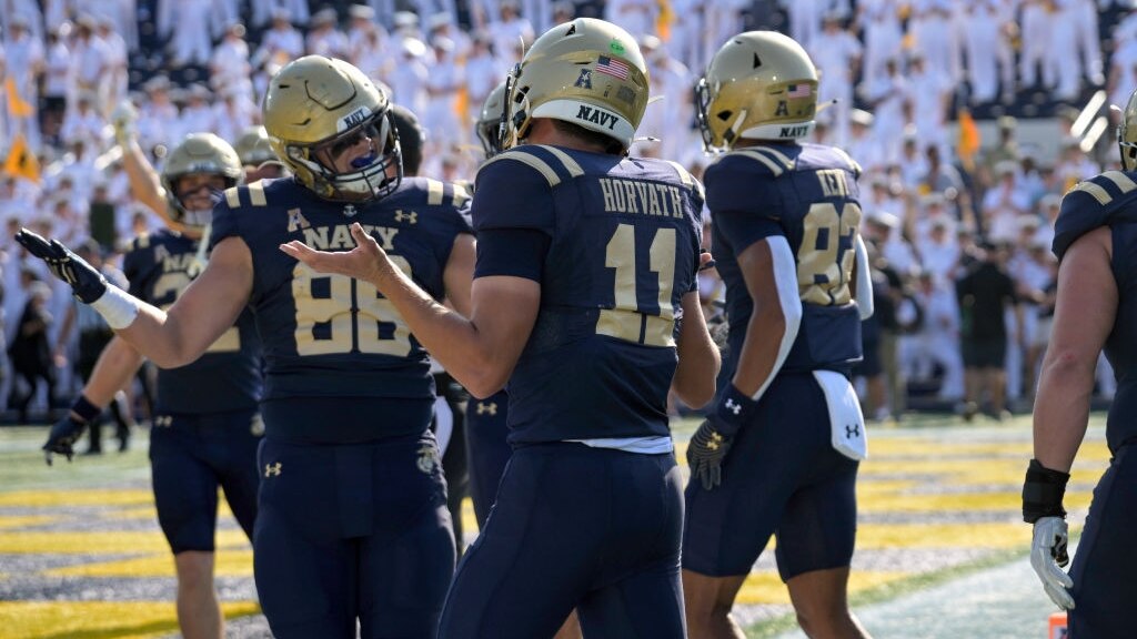 ANNAPOLIS, MD - SEPTEMBER 21:  Navy Midshipmen quarterback Blake Horvath (11) reacts with tight end Thomas Scully (88) following his touchdown run during the Memphis Tigers game versus the Naval Academy Midshipmen on September 21, 2024 at Navy - Marine Corps Memorial Stadium in Annapolis, MD. (Photo by Mark Goldman/Icon Sportswire via Getty Images)