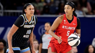 Angel Reese #5 of the Atlanta Dream is defended by Kamilla Cardoso #10 of the Chicago Sky during the second half.