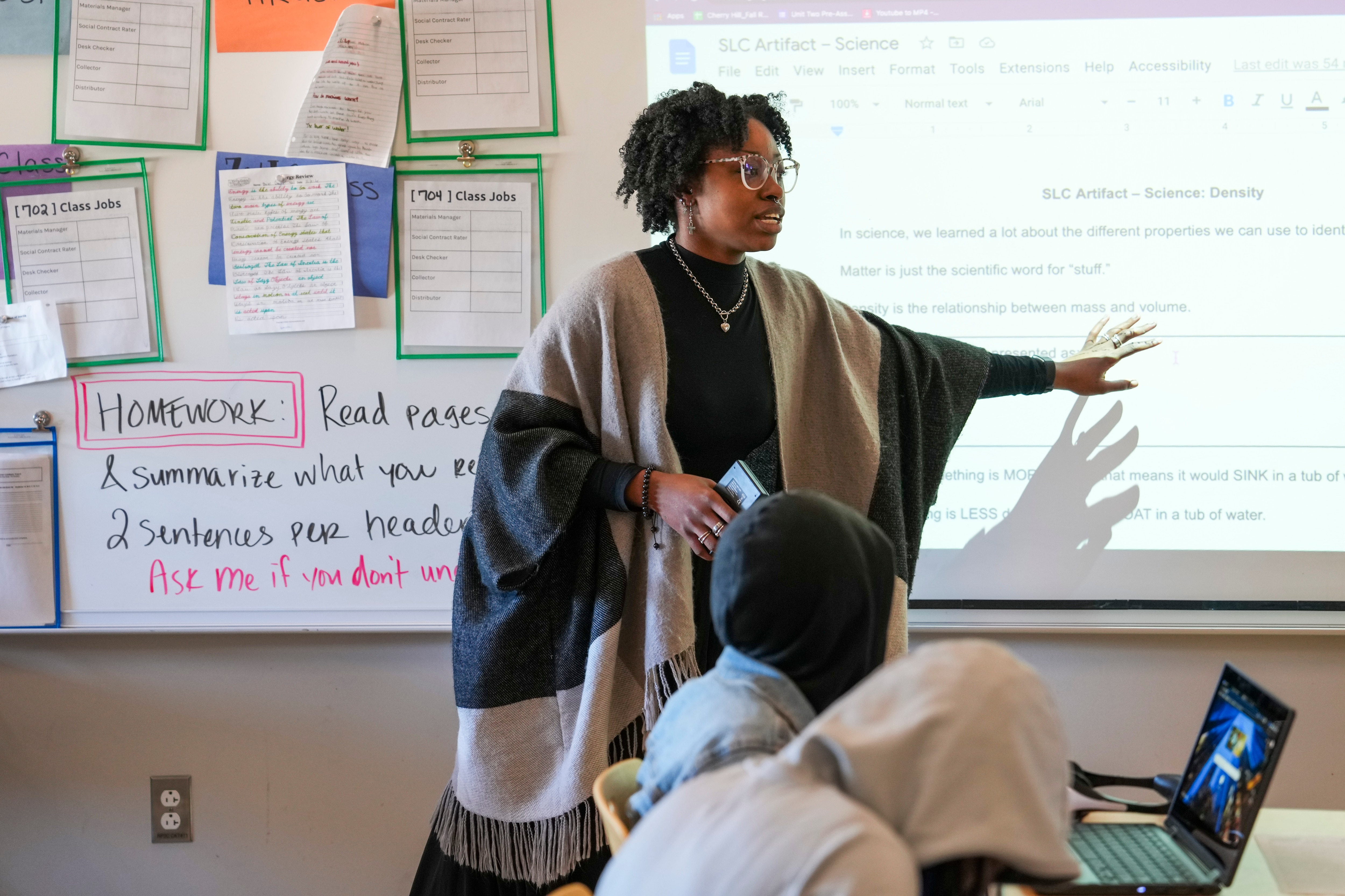 Malaysia McGinnis, seventh grade science teacher, demonstrates an assignment for the class at Cherry Hill Elementary and Middle school.