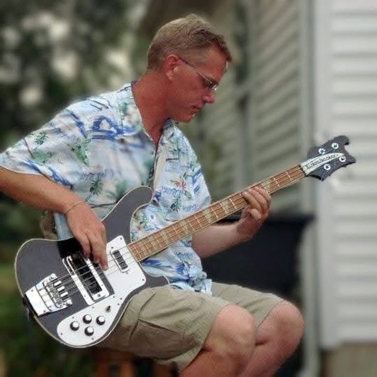 Matt Tacka playing the bass he owned for over 30 years. Tacka played basss from the age of 9.