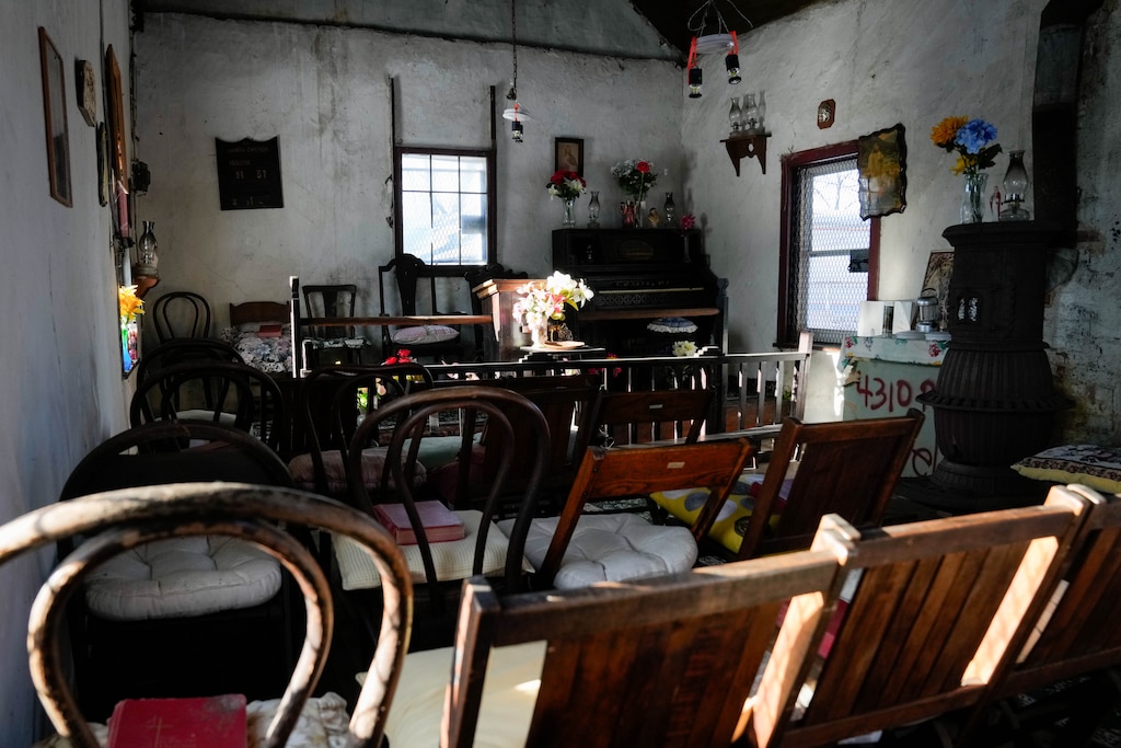 The interior, filled with religious iconography, of Dowden Chapel in Overlea, Md., on Friday, February 13, 2026. The chapel is a Black Methodist church and cemetery in the Fullerton/Overlea region that was once a hiding place on the Underground Railroad.