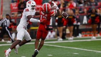 Maryland wide receiver Chris Durr Jr. (13) is unable to make a catch against Rutgers defensive back Jesse Ofurie (16) during the first half of an NCAA football game on Saturday, Oct. 17, 2026 in College Park, Md. (AP Photo/Mike Buscher)