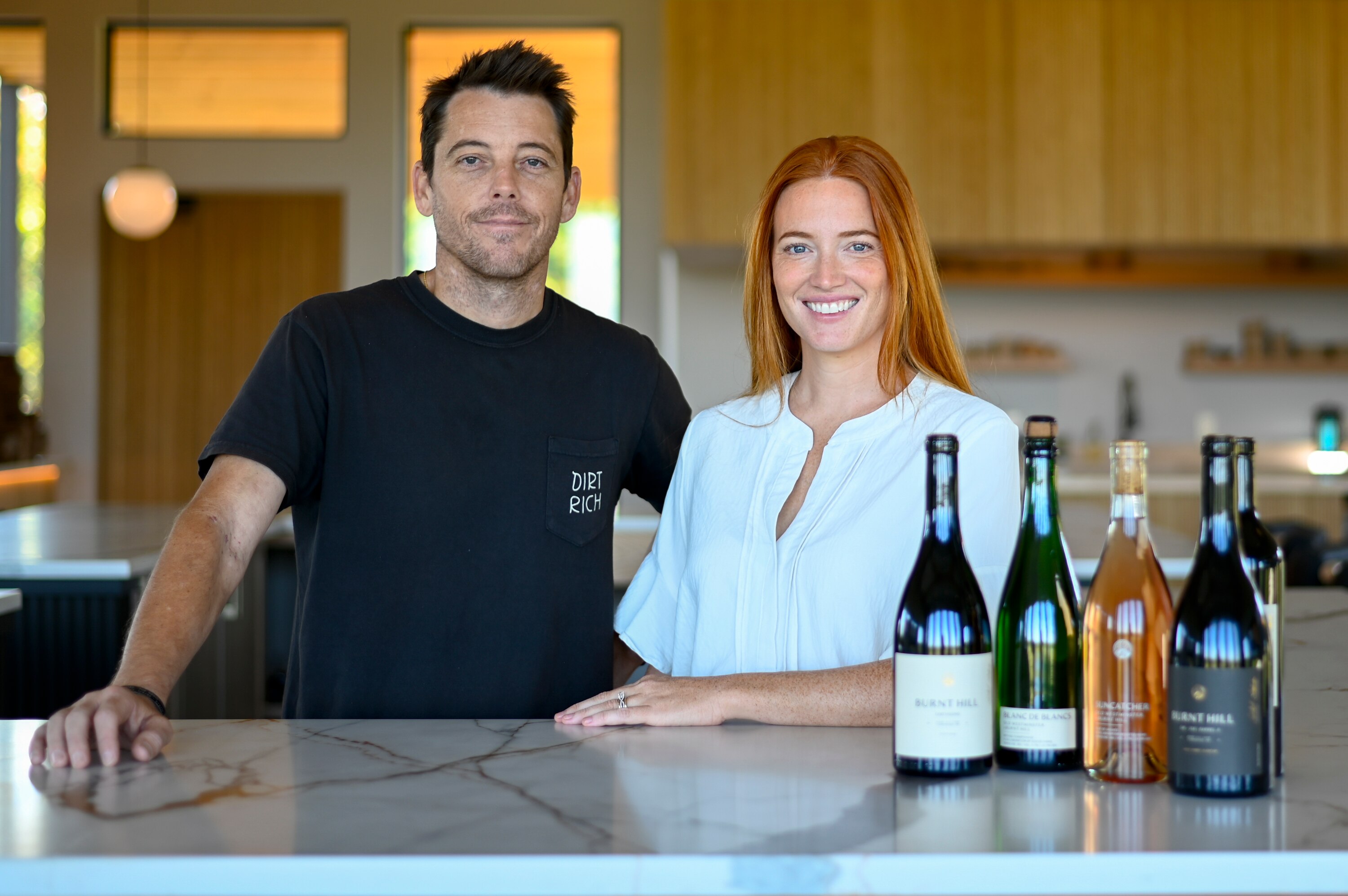 Sept. 12, 2025 - Siblings Drew Baker and Ashli Johnson pose for a portrait inside the tasting room, situated atop the rolling hills of Burnt Hill Farm.