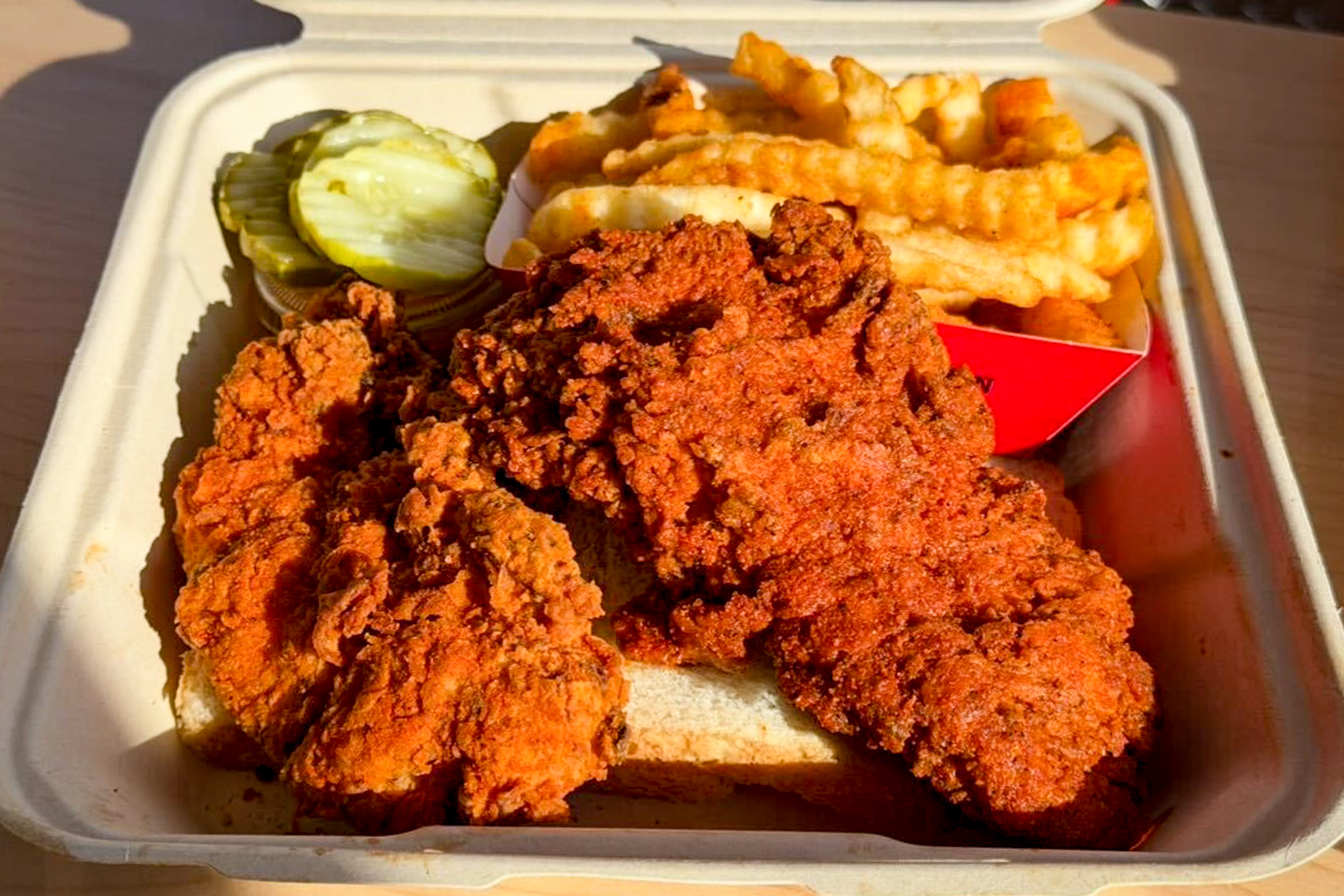 A lite mild and mild chicken tender meal with fries from Dave’s Hot Chicken in Rockville. 