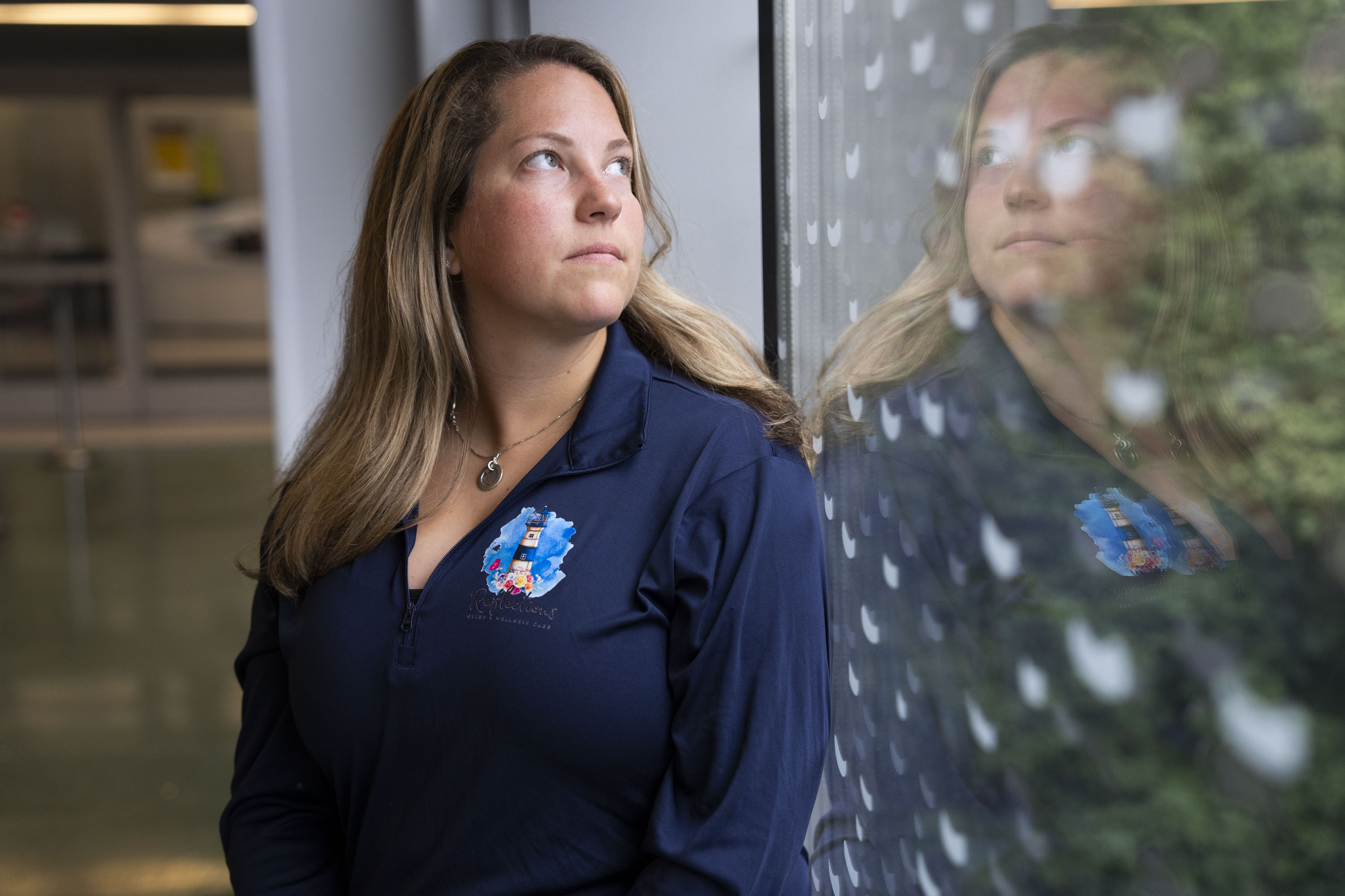 Sarah Ernst, a senior research specialist who helped organize an effort to illuminate the dome at the top of Johns Hopkins' Billings Building in pink and blue for a second year. 
