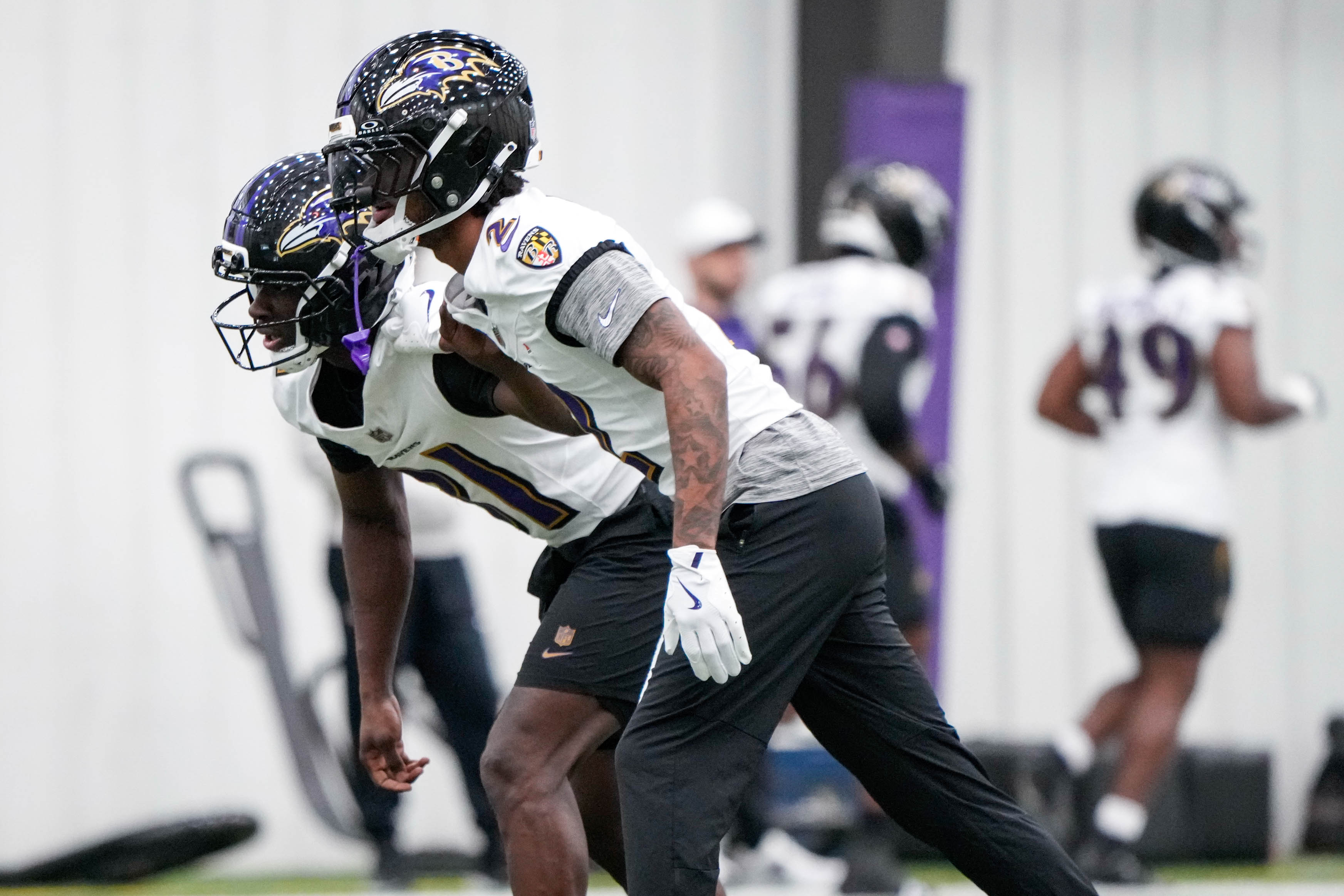Cornerback Nate Wiggins (2) prepares to guard wide receiver Devontez Walker (81) during organized team activities on May 28.