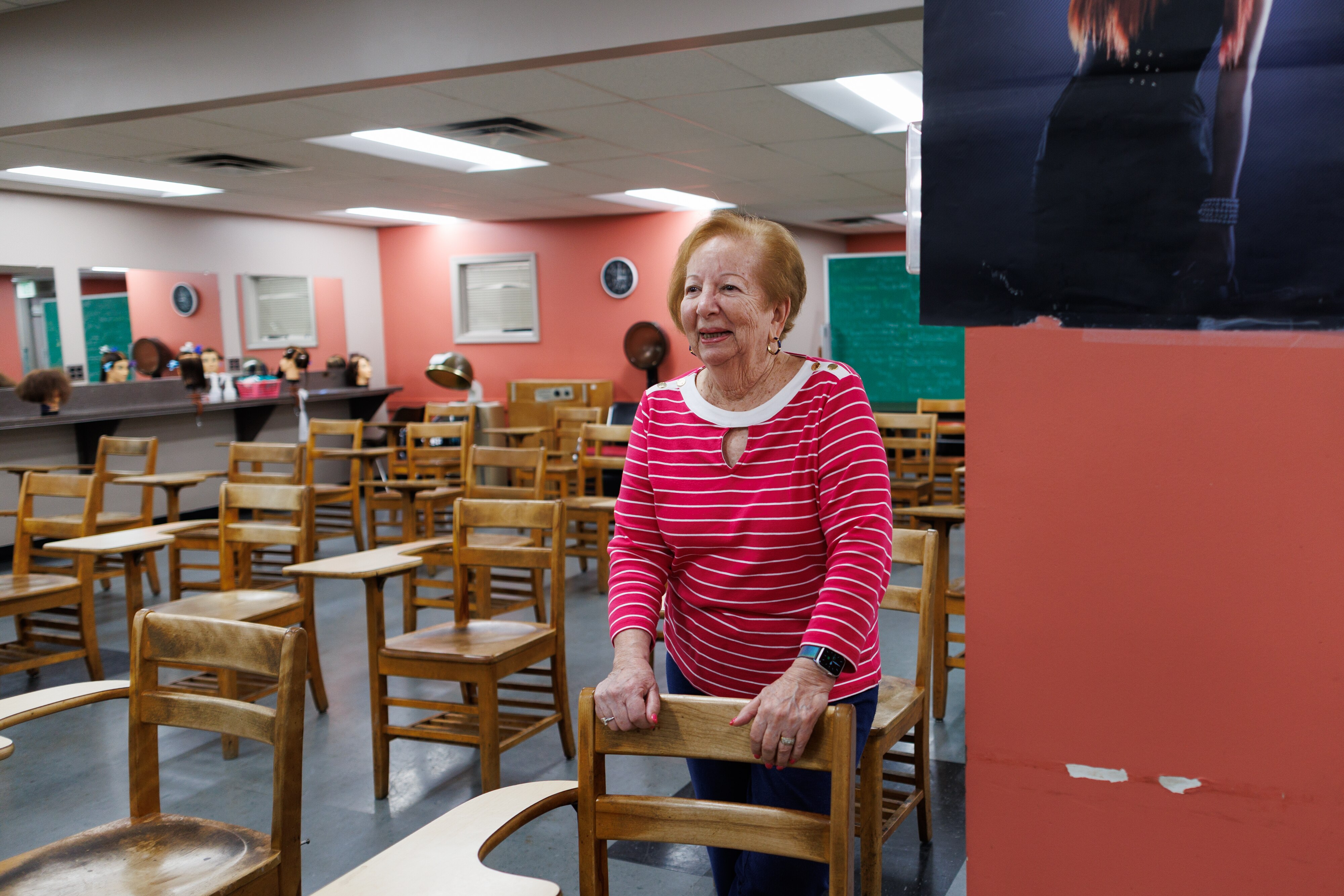 Maxine Sisserman, wife of the late Larry Sisserman who was the founder of the Baltimore Studio of Hair Design, stands in the main classroom at the school.