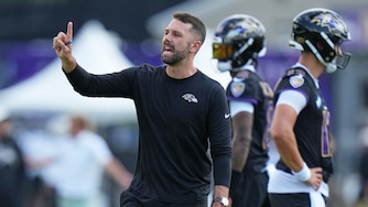Baltimore Ravens offensive coordinator Declan Doyle coaches during practice at the team's NFL football training camp, Wednesday, July 29, 2026, at the Under Armour Performance Center in Owings Mills, Md.