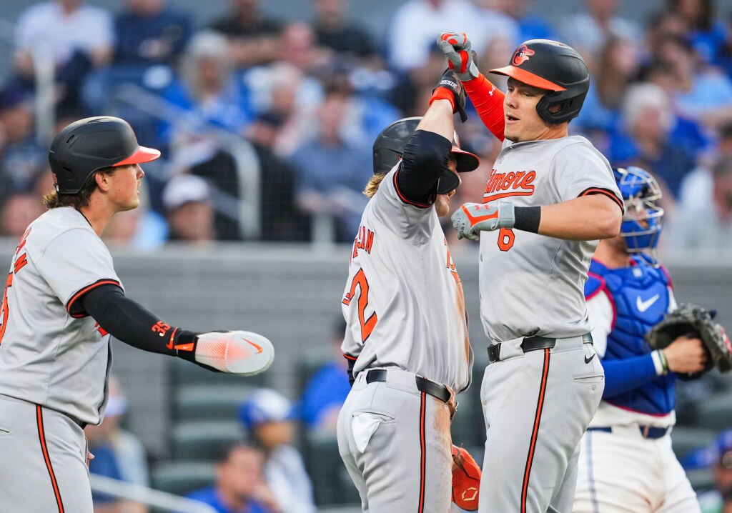 TORONTO, ON - JUNE 4: Ryan Mountcastle #6 of the Baltimore Orioles celebrates his three-run home run with Gunnar Henderson #2 and Adley Rutschman #35 in the third inning against the Toronto Blue Jays at the Rogers Centre on June 4, 2024 in Toronto, Ontario, Canada. (Photo by Mark Blinch/Getty Images)