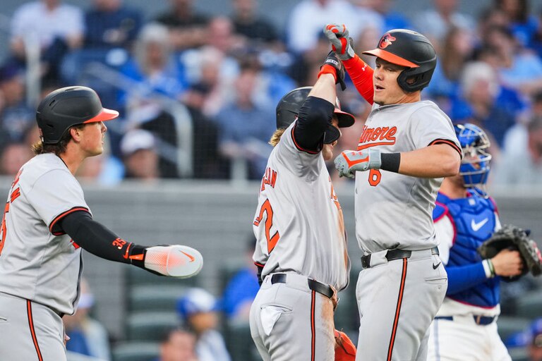 TORONTO, ON - JUNE 4: Ryan Mountcastle #6 of the Baltimore Orioles celebrates his three-run home run with Gunnar Henderson #2 and Adley Rutschman #35 in the third inning against the Toronto Blue Jays at the Rogers Centre on June 4, 2024 in Toronto, Ontario, Canada. (Photo by Mark Blinch/Getty Images)