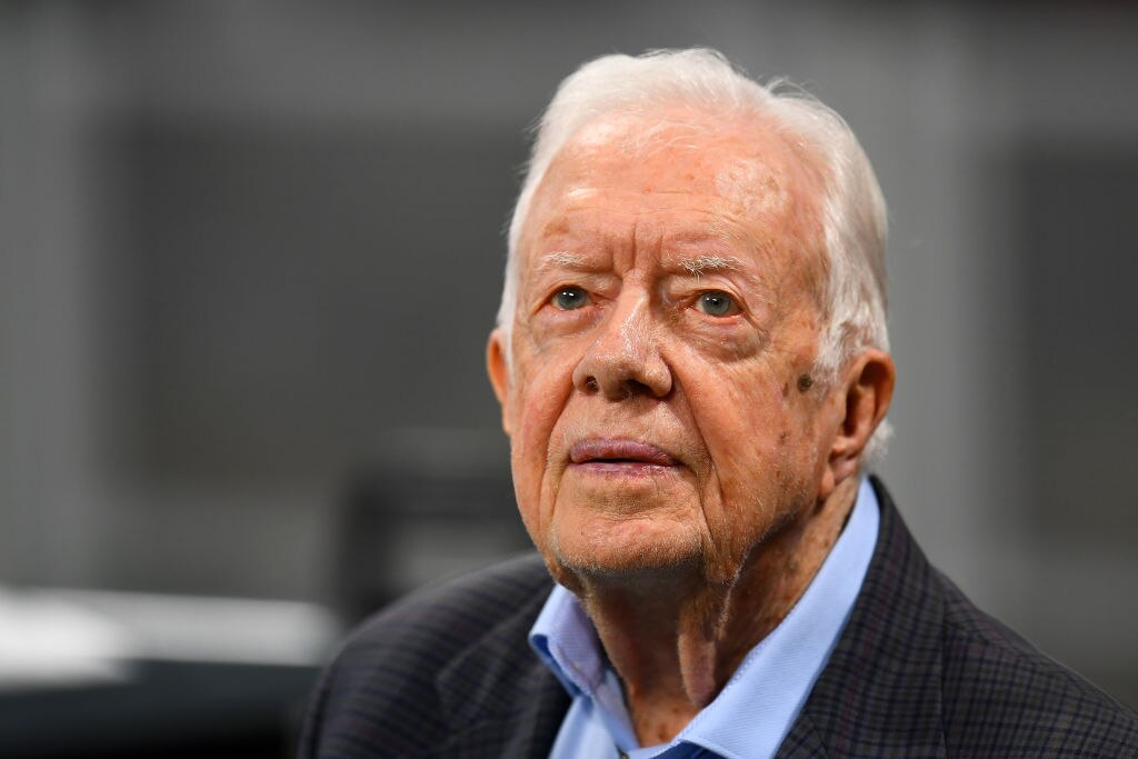 Former president Jimmy Carter prior to the game between the Atlanta Falcons and the Cincinnati Bengals at Mercedes-Benz Stadium on September 30, 2018 in Atlanta, Georgia.