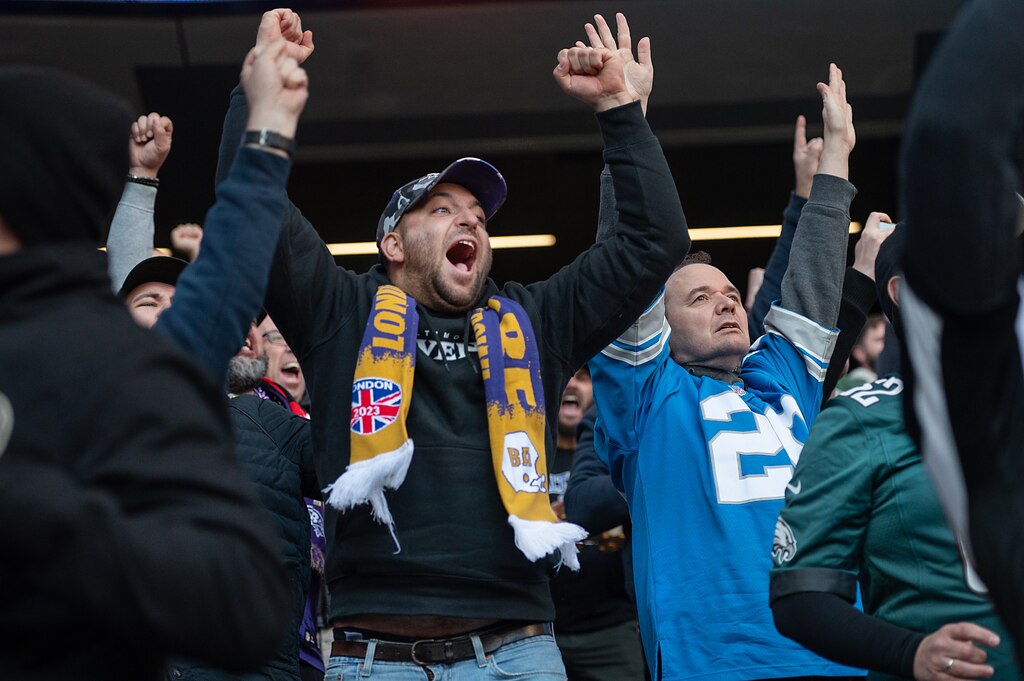 Fans cheer for their team during the Baltimore Ravens and Tennessee Titans match up in London on Oct. 15, 2023.
