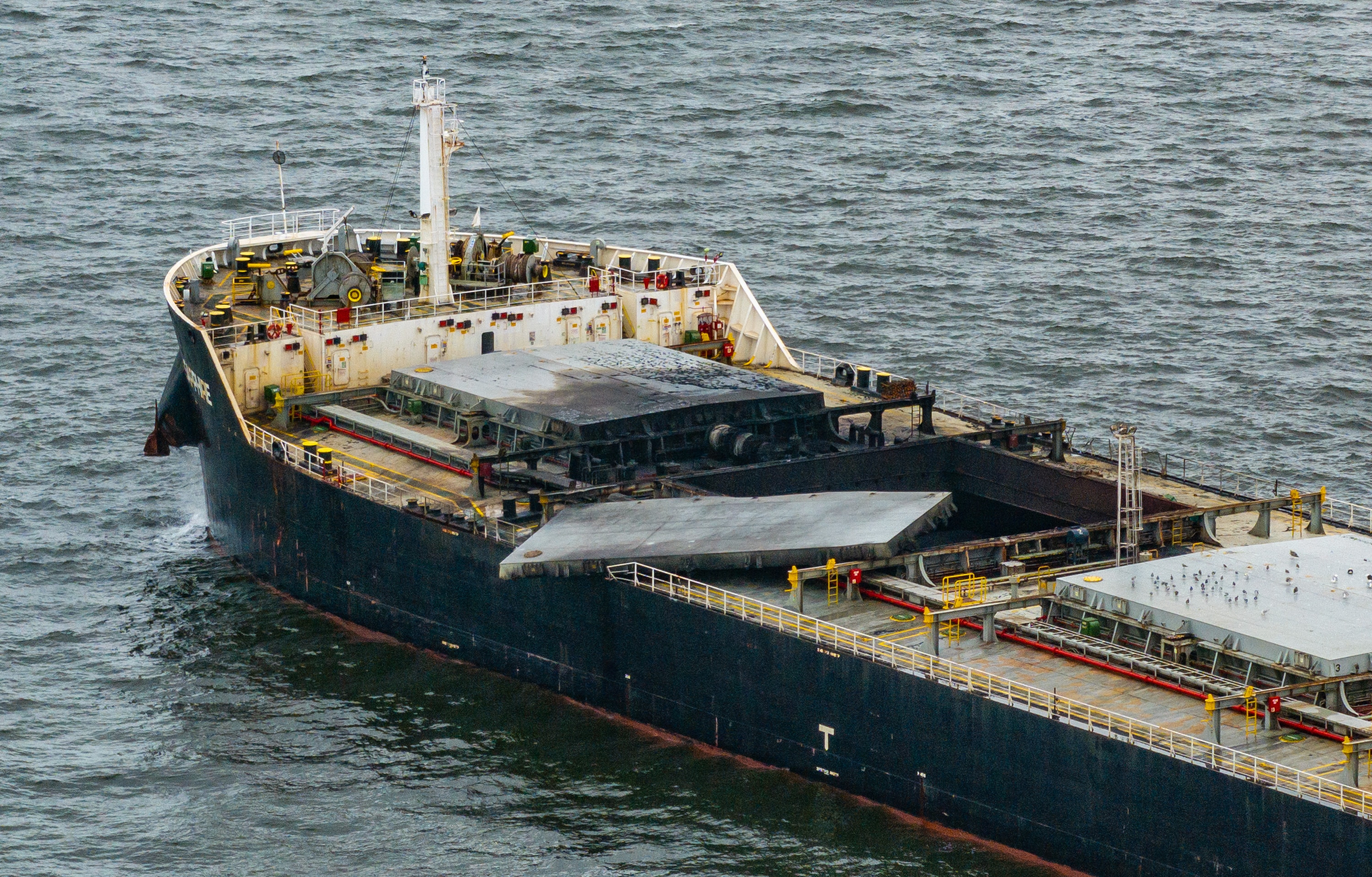 he W-Sapphire bulk carrier is seen anchored off Sandy Point the morning after an explosion occurred in one of its holds as it was leaving the Port of Baltimore