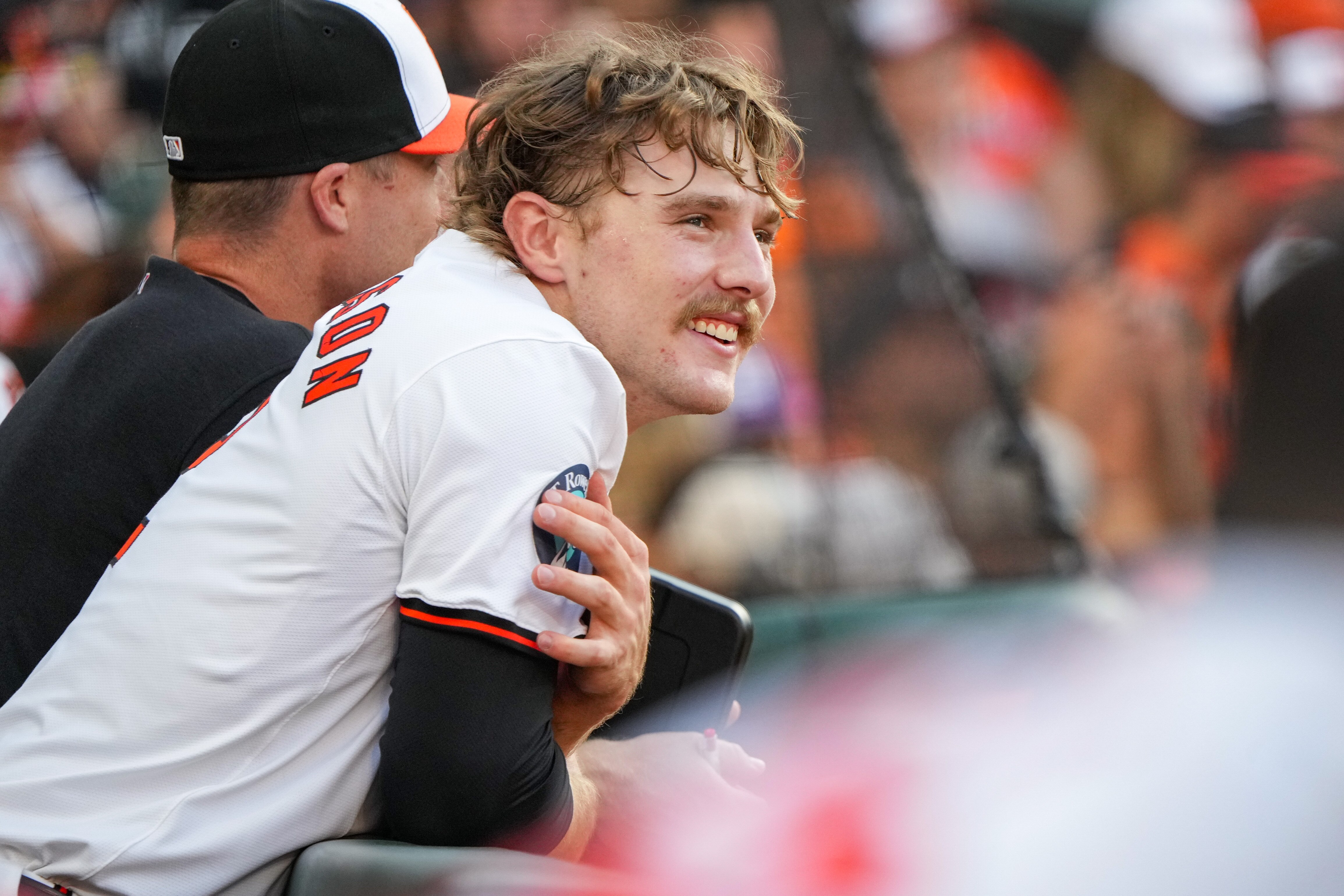 Baltimore Orioles shortstop Gunnar Henderson (2) smiles in the dugout during game two of a series against the Atlanta Braves at Camden Yards on June 12, 2024.