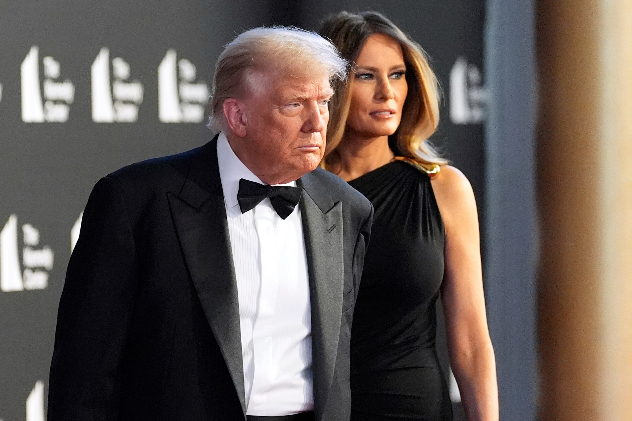 President Donald Trump and first lady Melania Trump arrive to view opening night of "Les Miserables," at the Kennedy Center, Wednesday, June 11, 2025, in Washington. (AP Photo/Alex Brandon)