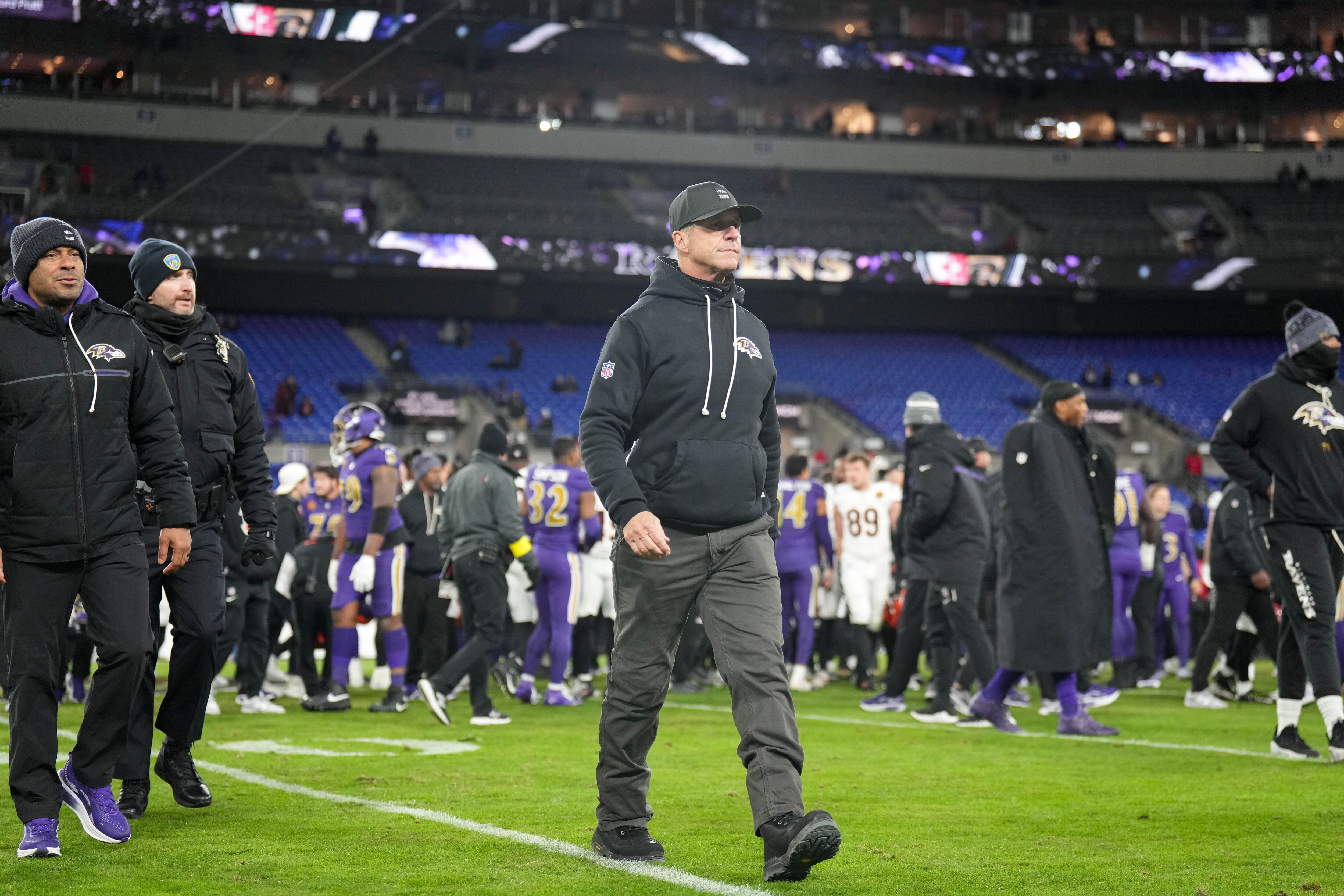 Baltimore Ravens head coach John Harbaugh walks back to the locker room after losing to the Cincinnati Bengals on Thanksgiving at M&T Bank Stadium.