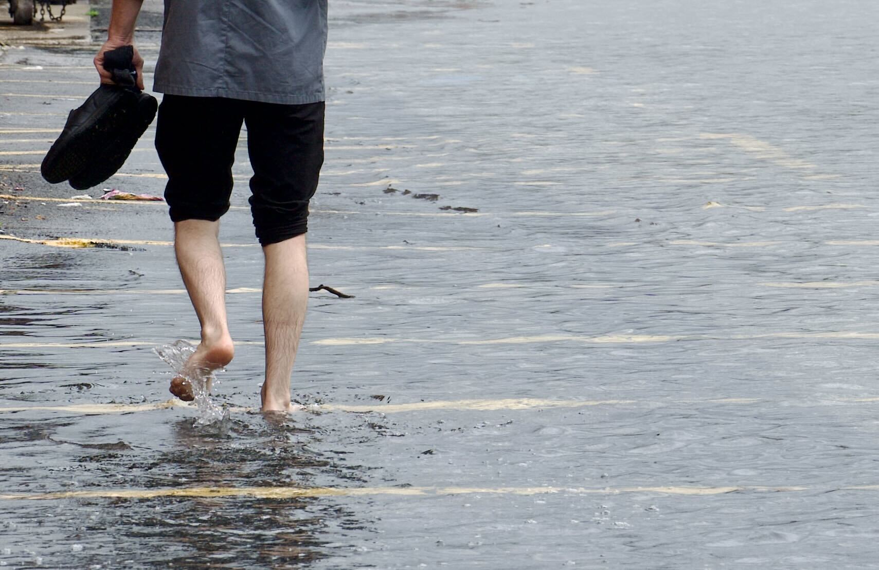 Flooding near the Inner Harbor in Baltimore as tropical storm Debby makes its way through Baltimore on Friday, August 9.